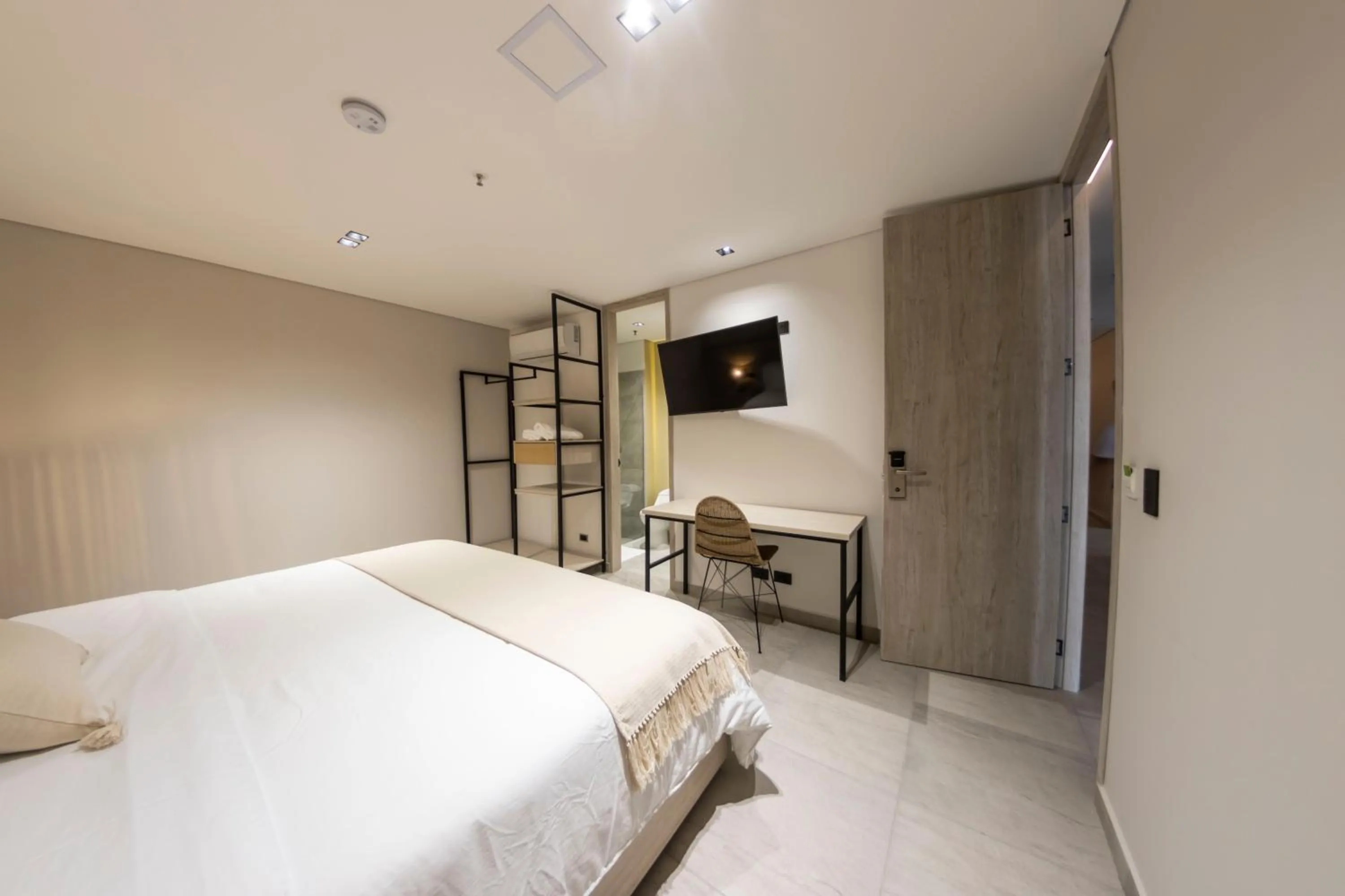 Bed in Sonata 44 Hotel Laureles