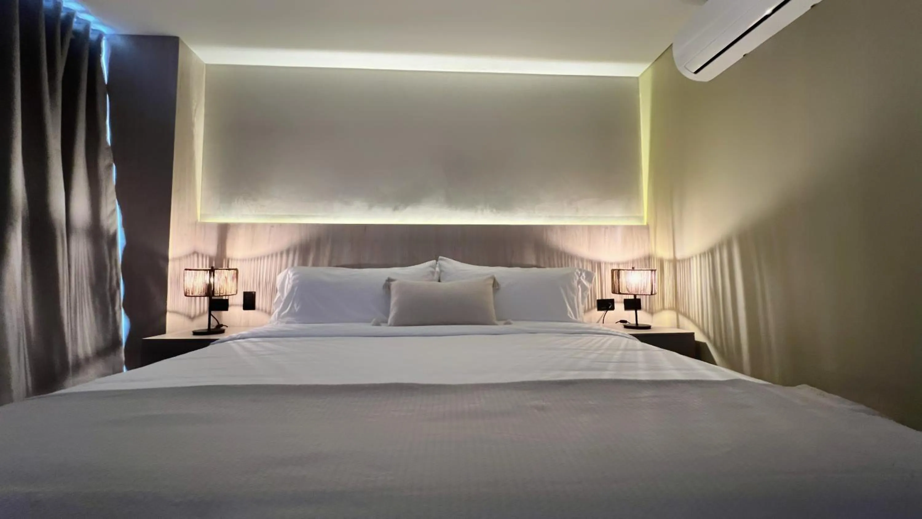 Bed in Sonata 44 Hotel Laureles