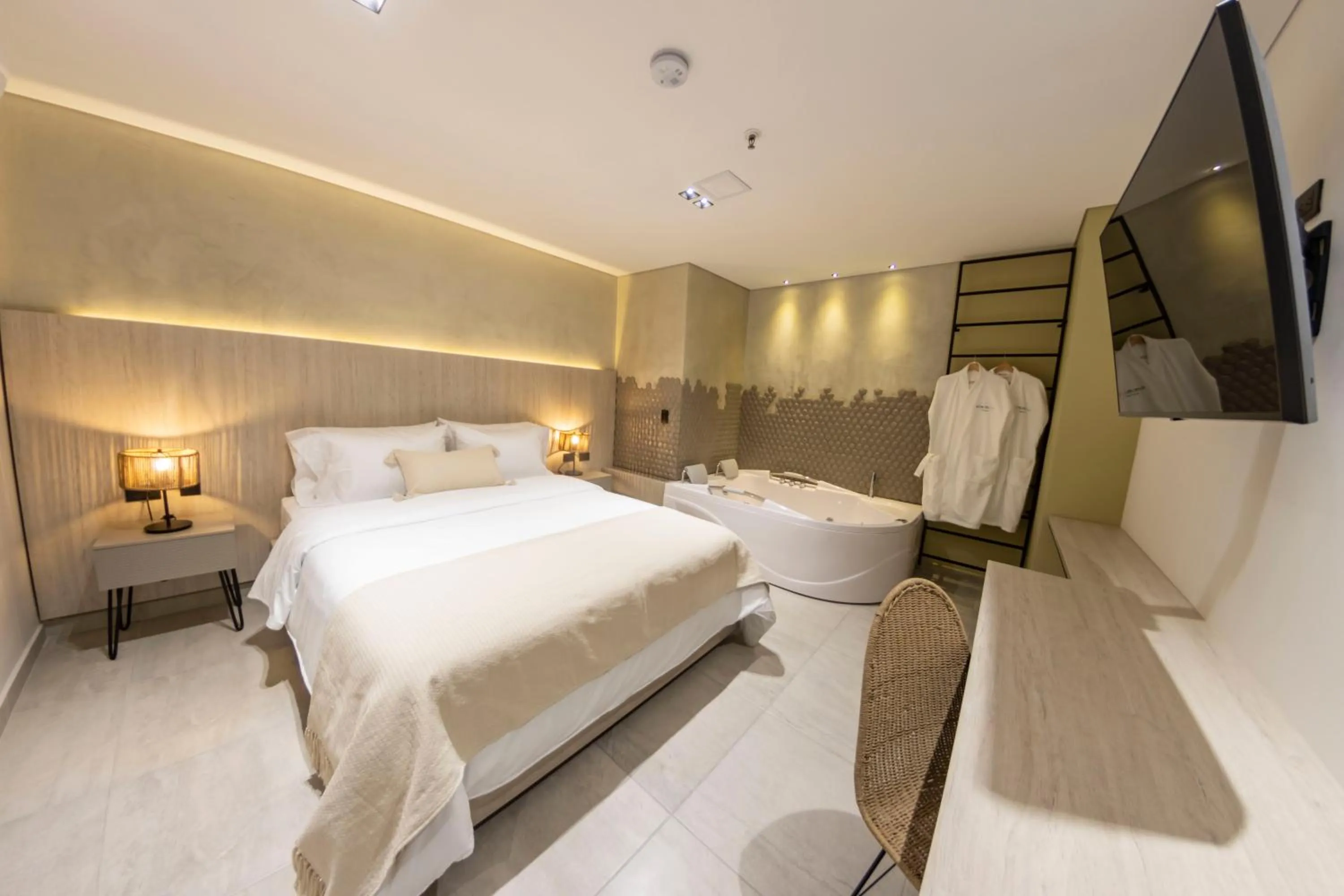 Bed in Sonata 44 Hotel Laureles