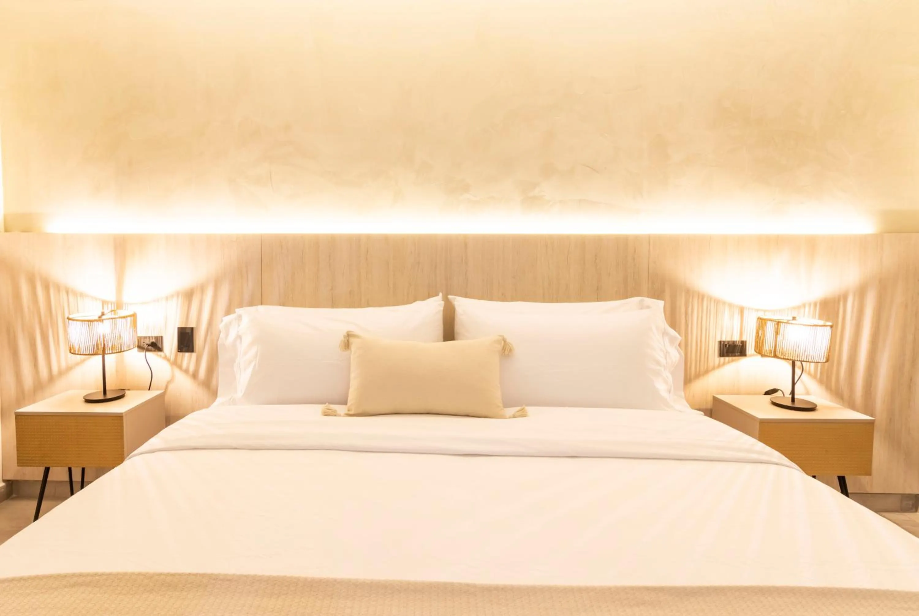 Bed in Sonata 44 Hotel Laureles