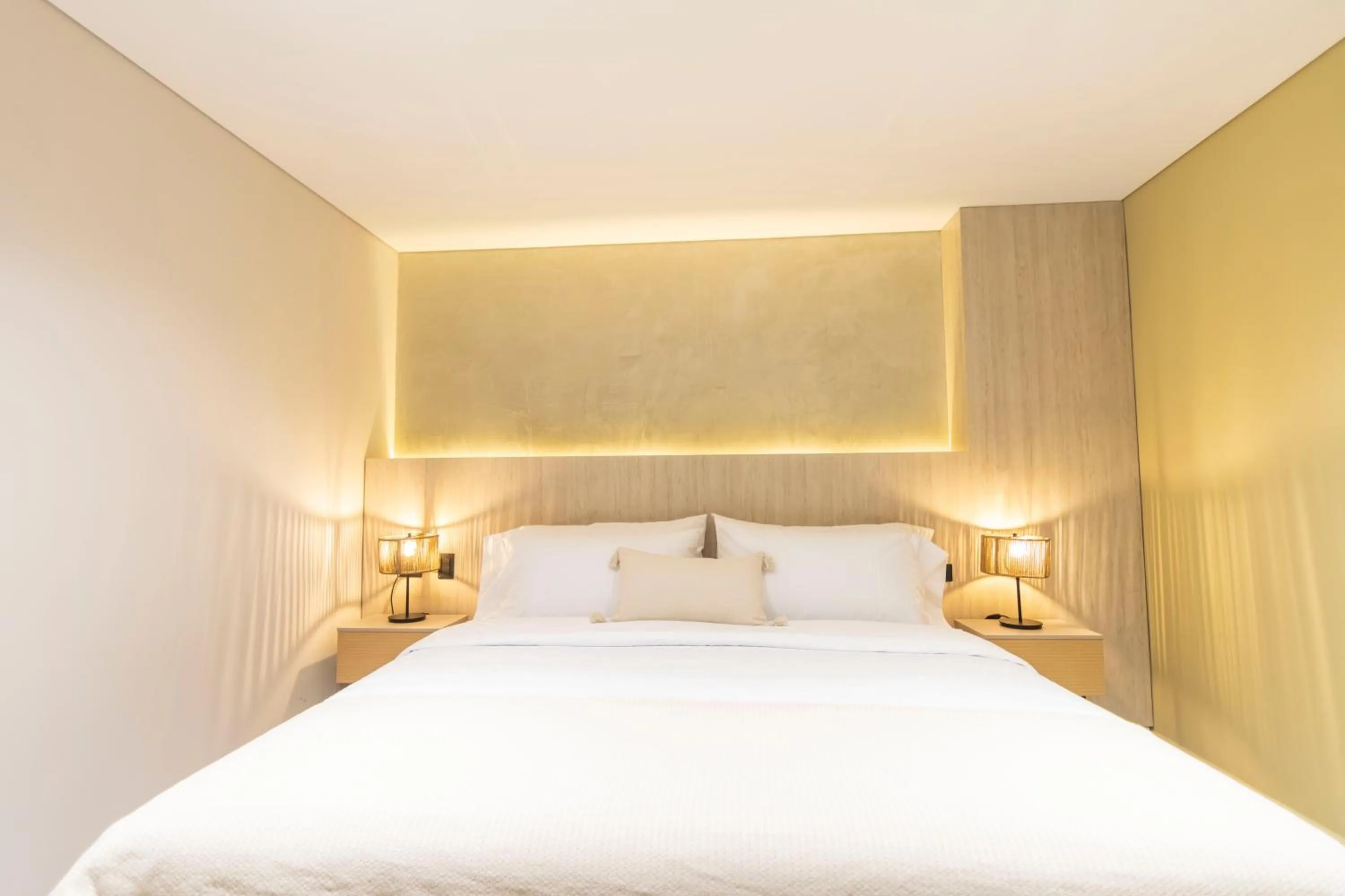 Bed in Sonata 44 Hotel Laureles