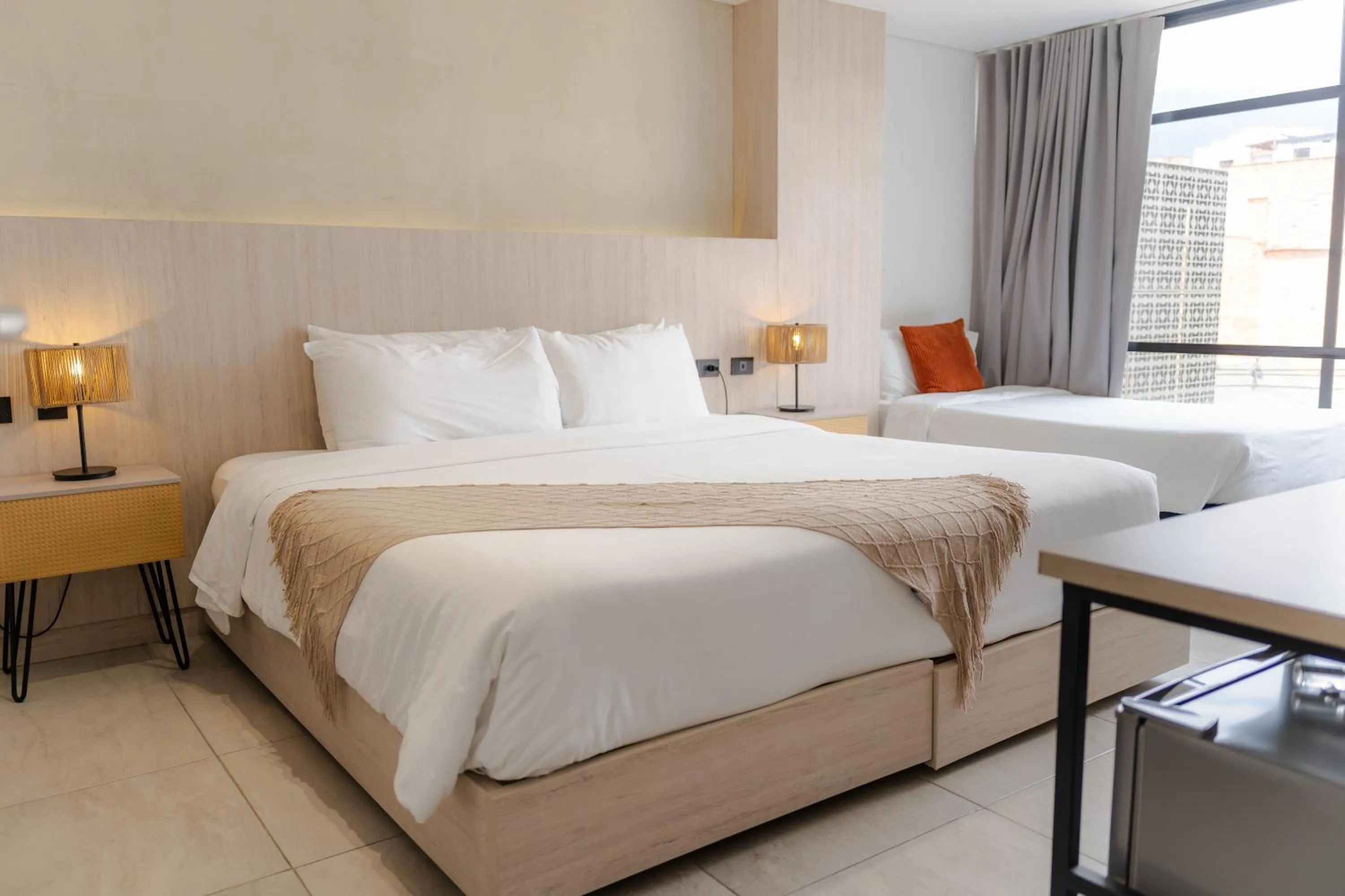 Bed in Sonata 44 Hotel Laureles