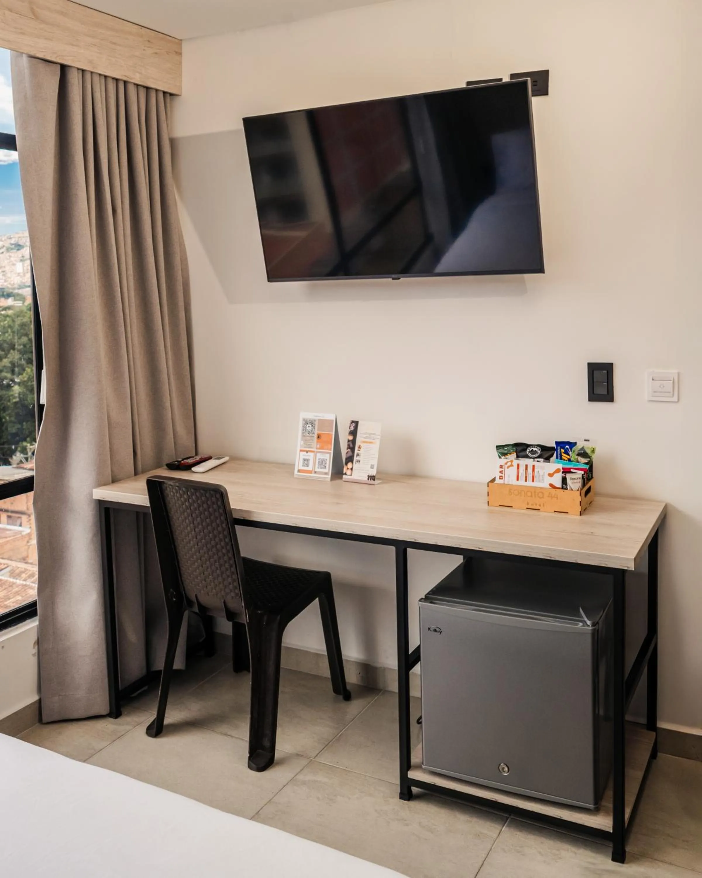 Bed in Sonata 44 Hotel Laureles