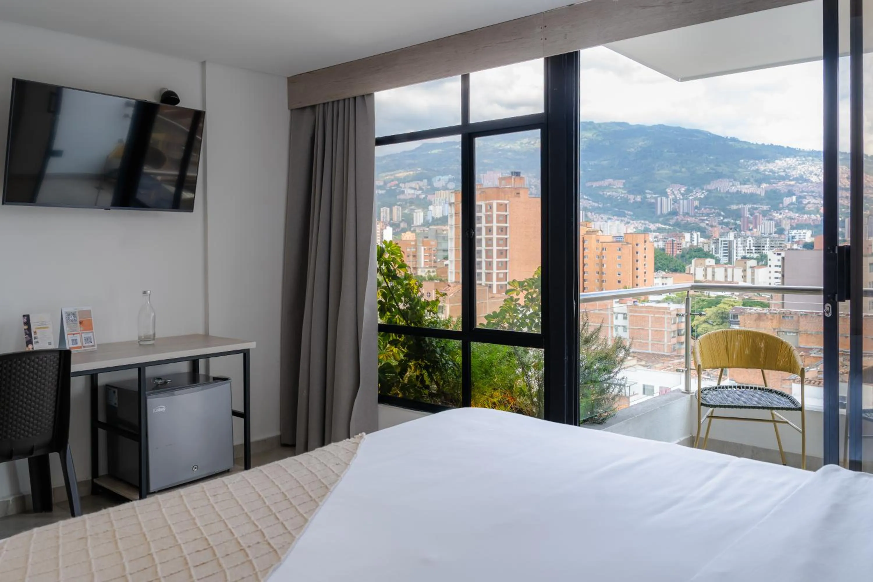Bed in Sonata 44 Hotel Laureles