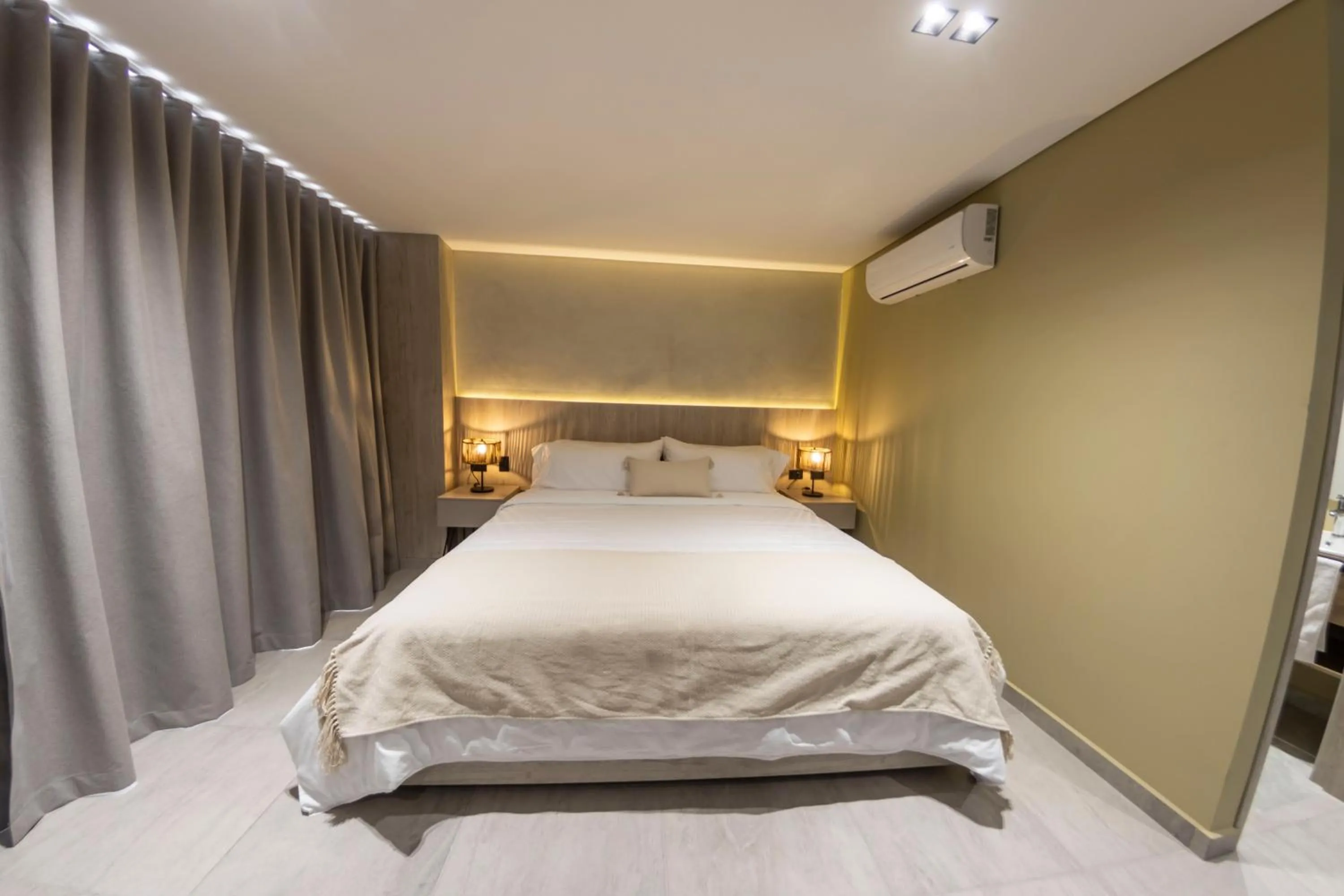 Bed in Sonata 44 Hotel Laureles