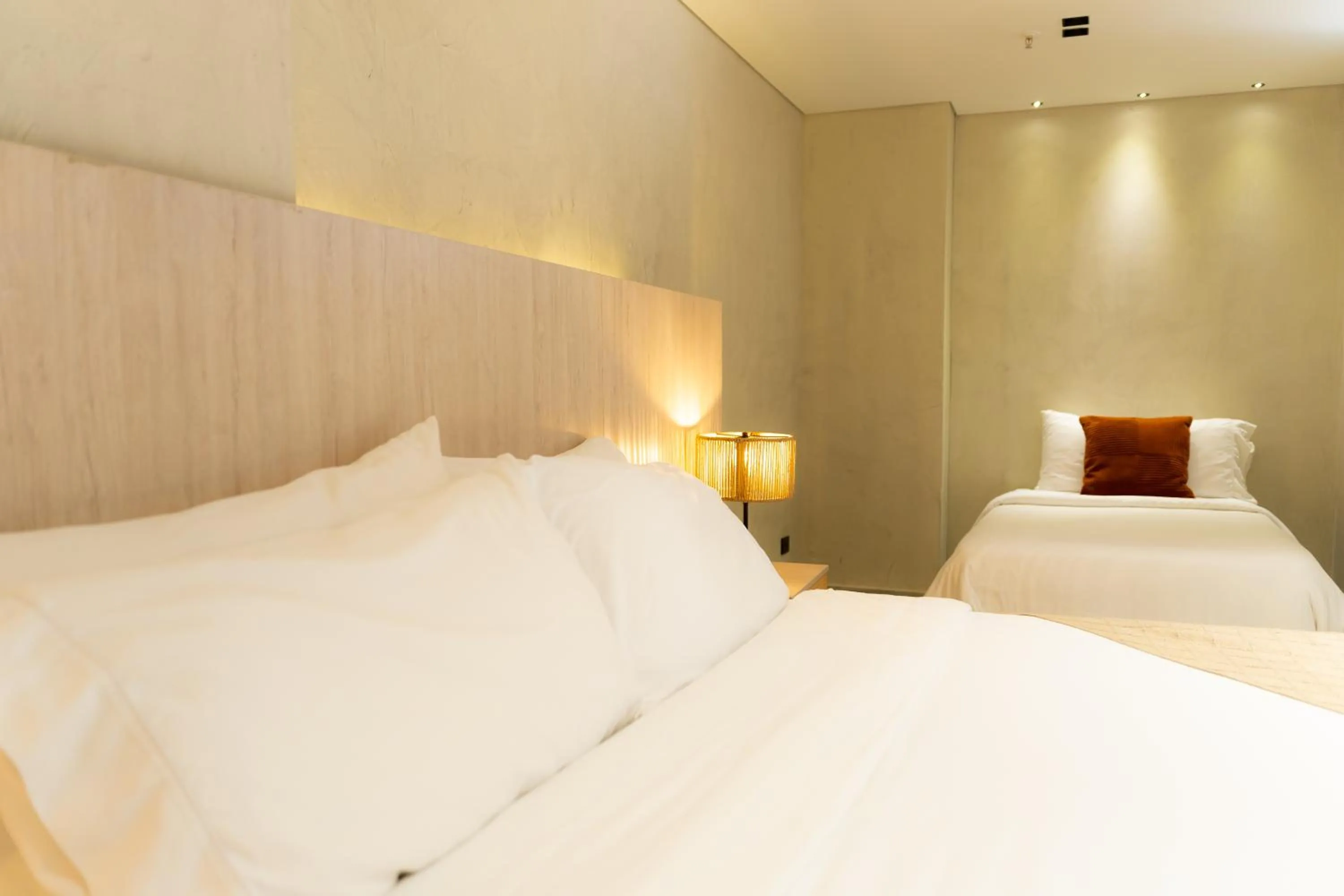 Bed in Sonata 44 Hotel Laureles