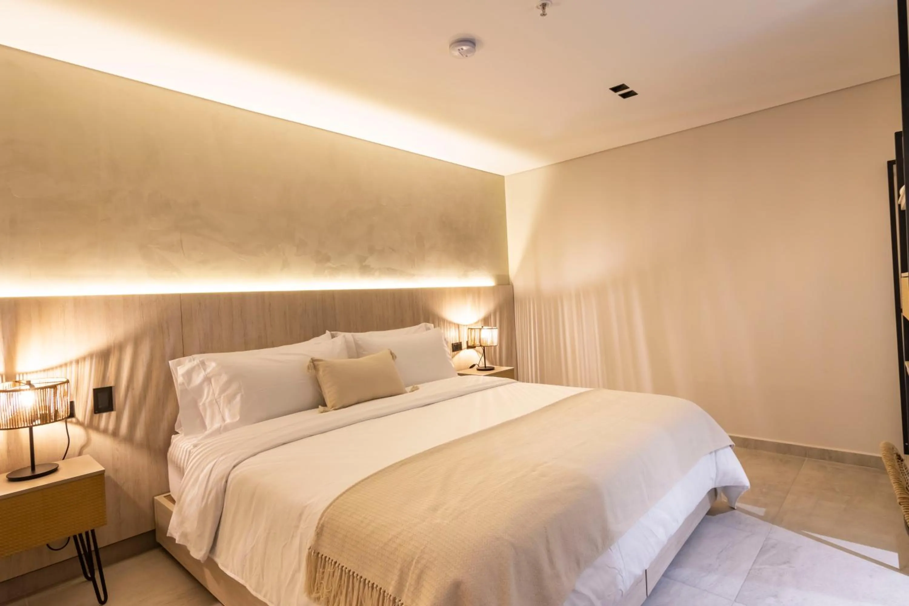 Bed in Sonata 44 Hotel Laureles