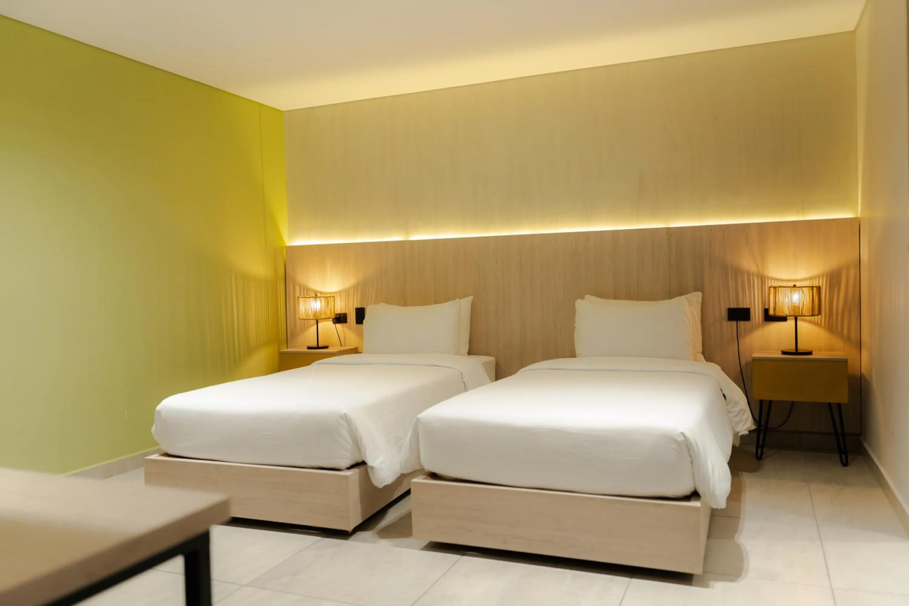 Bed in Sonata 44 Hotel Laureles