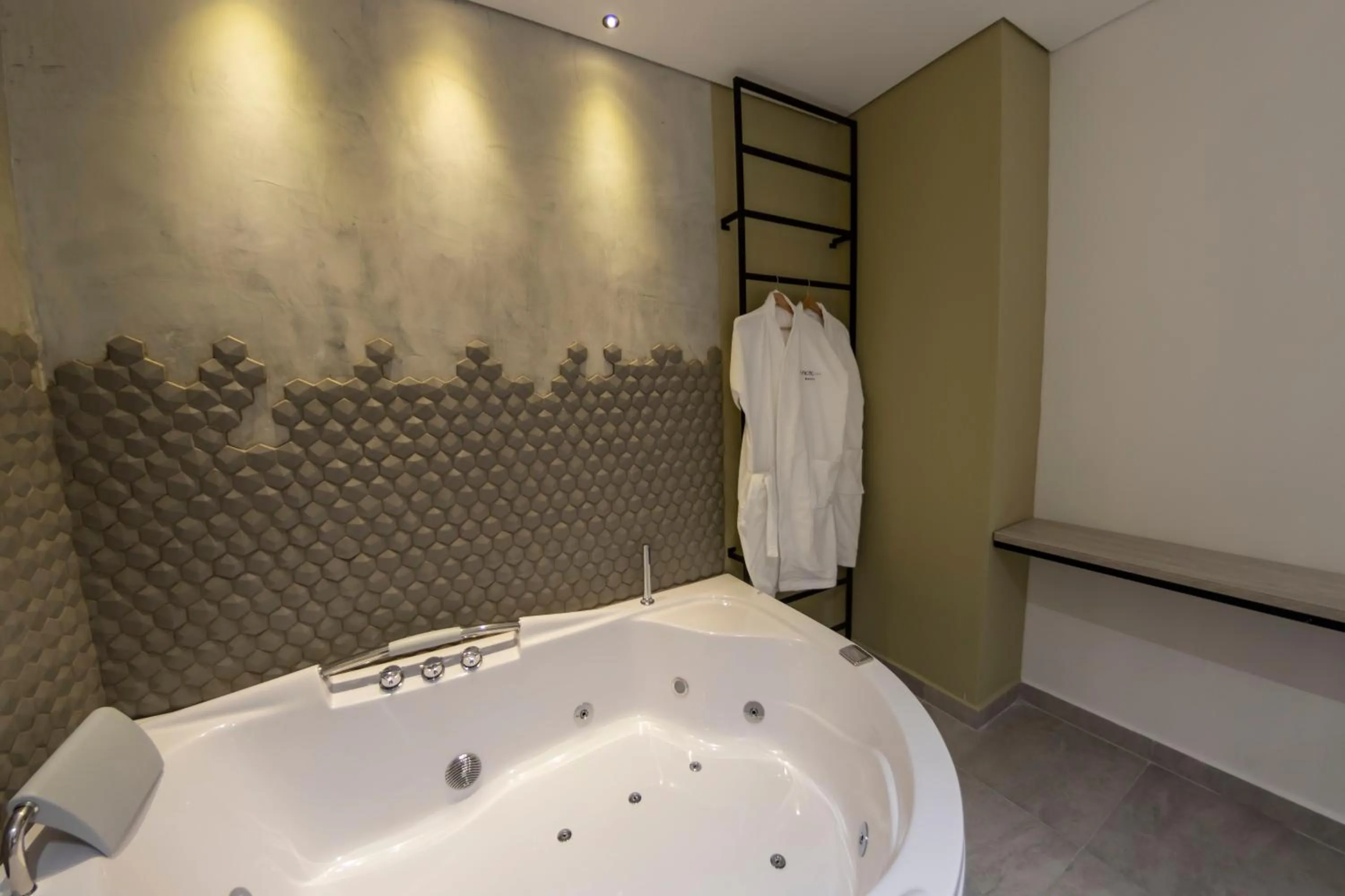 Bed in Sonata 44 Hotel Laureles