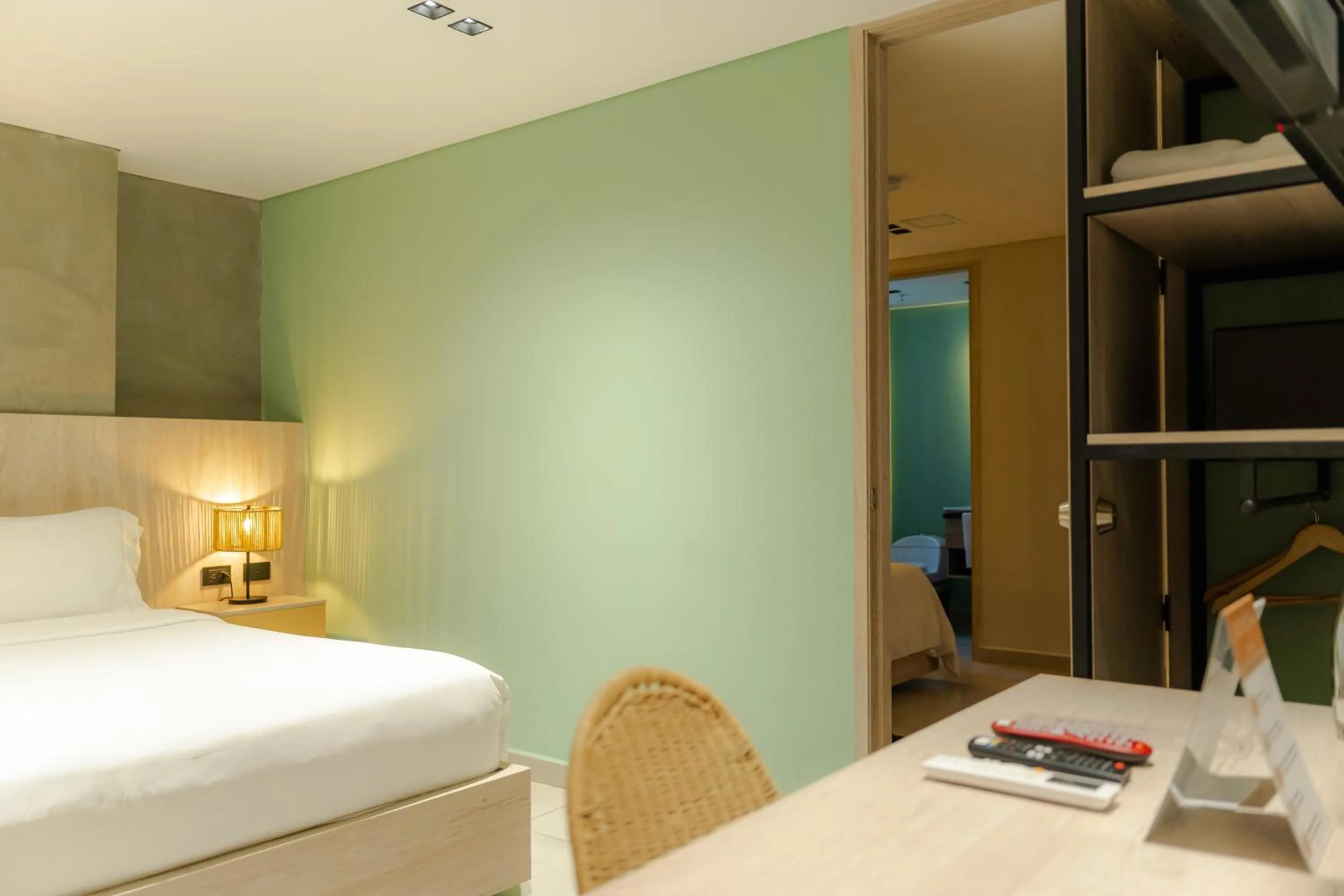 Bed in Sonata 44 Hotel Laureles