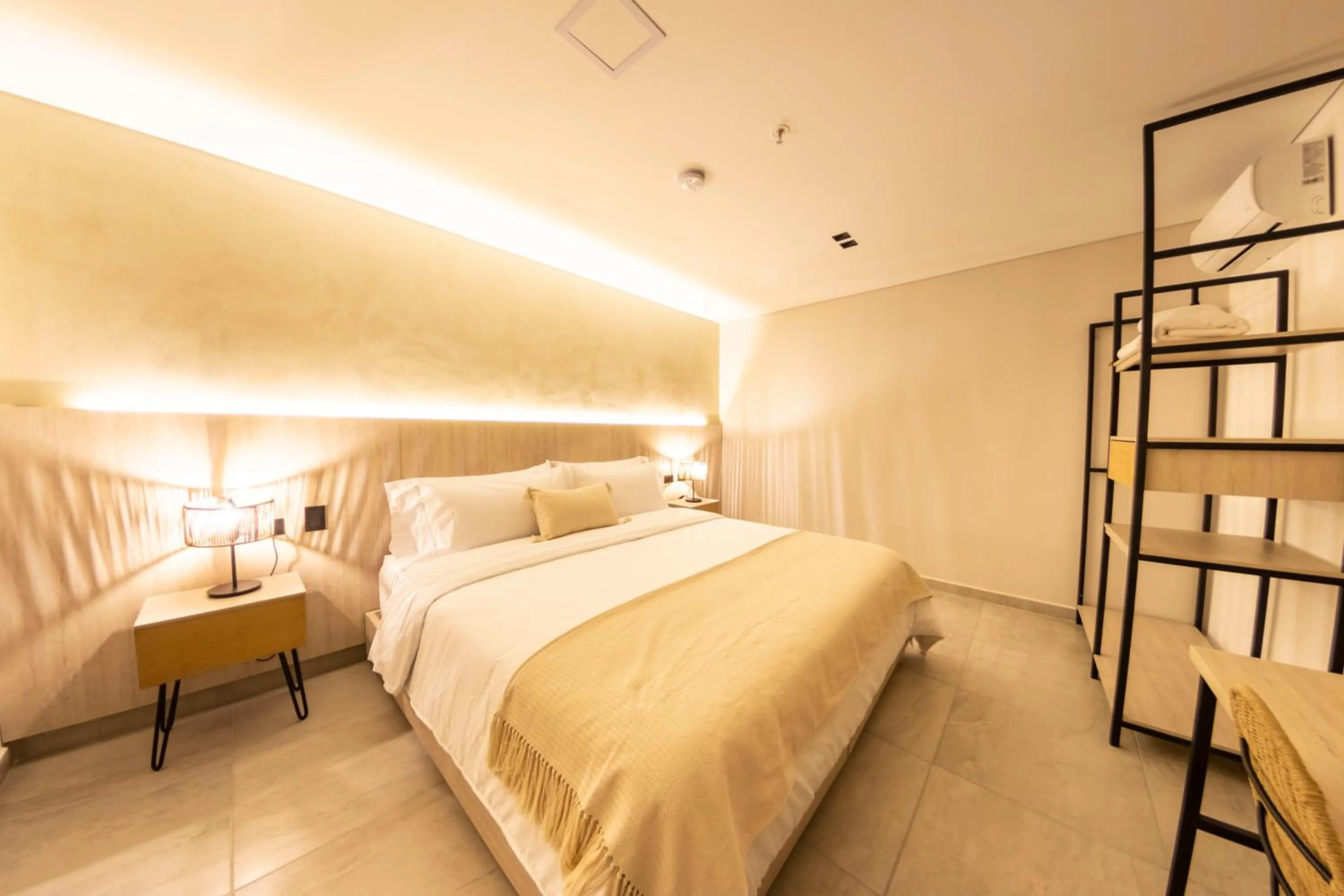 Bed in Sonata 44 Hotel Laureles