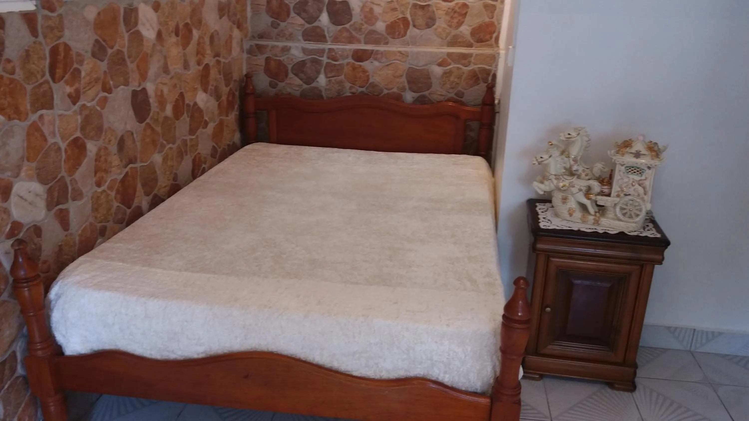 Bed in KANALU BEACH APPATEMENT