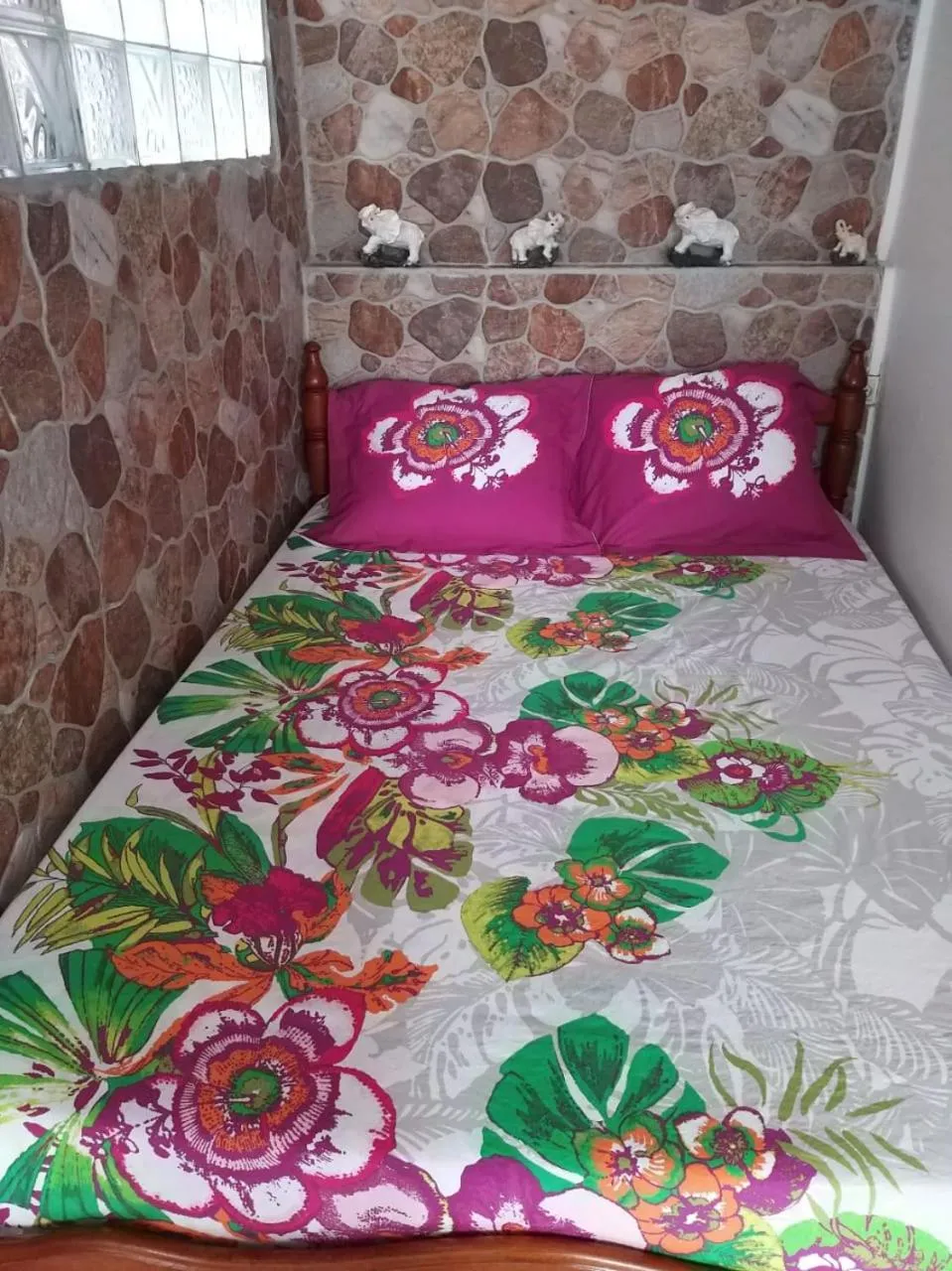Bed in KANALU BEACH APPATEMENT