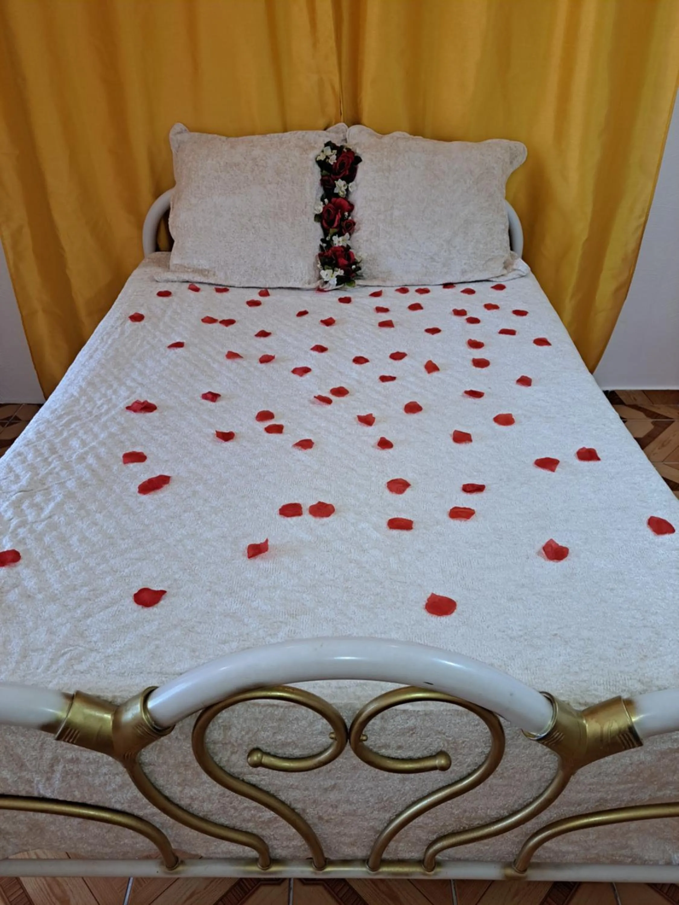 Bed in KANALU BEACH APPATEMENT