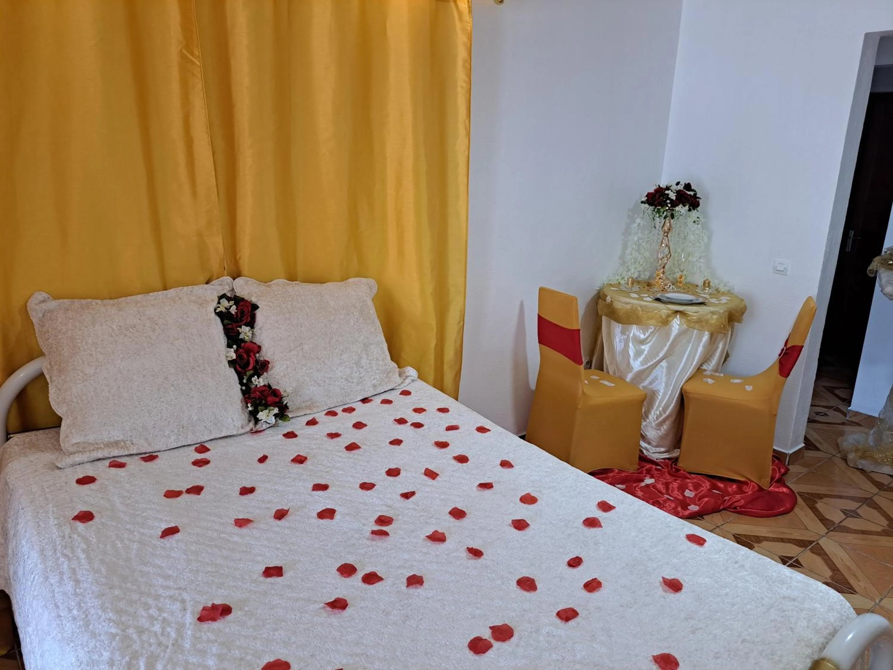 Bed in KANALU BEACH APPATEMENT
