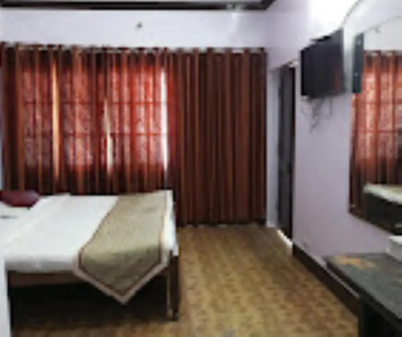 Bed in Hotel H. K. Legacy Nainital Bed in Hotel H. K. Legacy Nainital