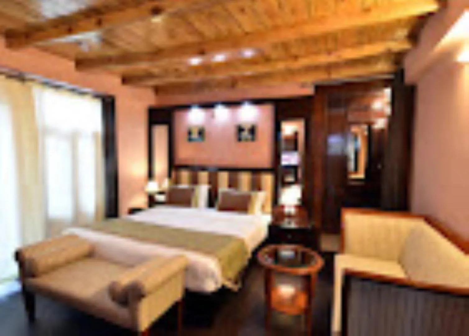 Bed in Hotel H. K. Legacy Nainital