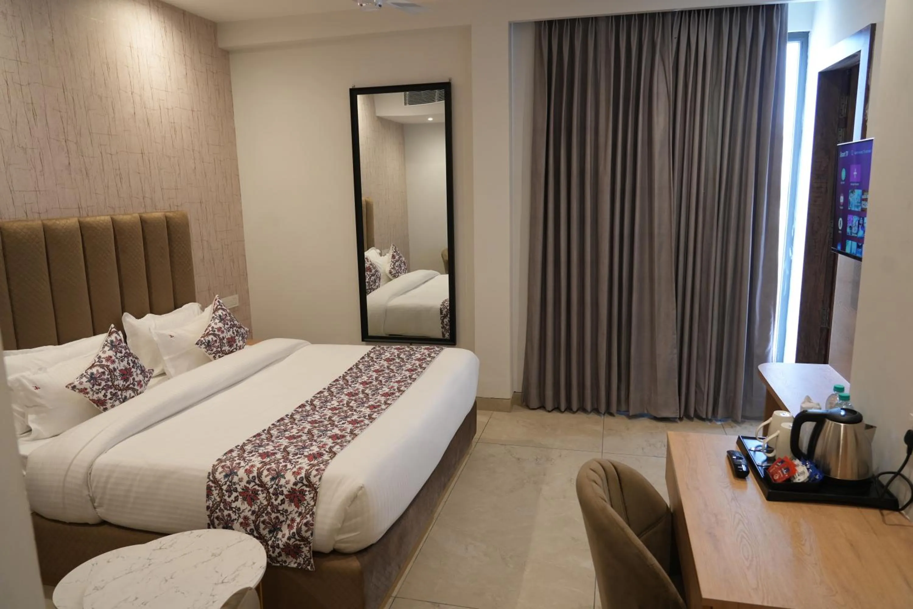 Bed in ACR Luxury Hotel