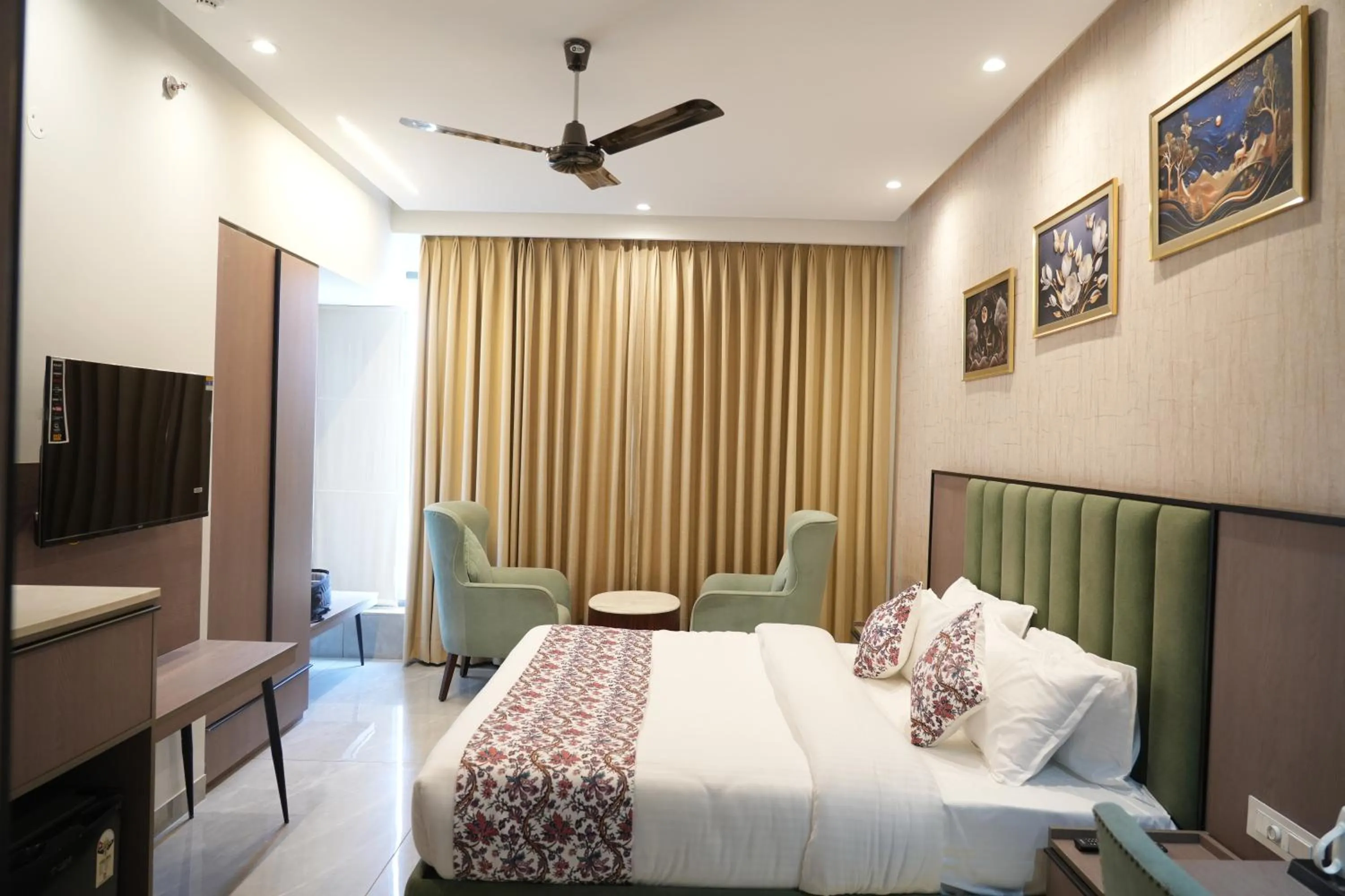 Bed in ACR Luxury Hotel