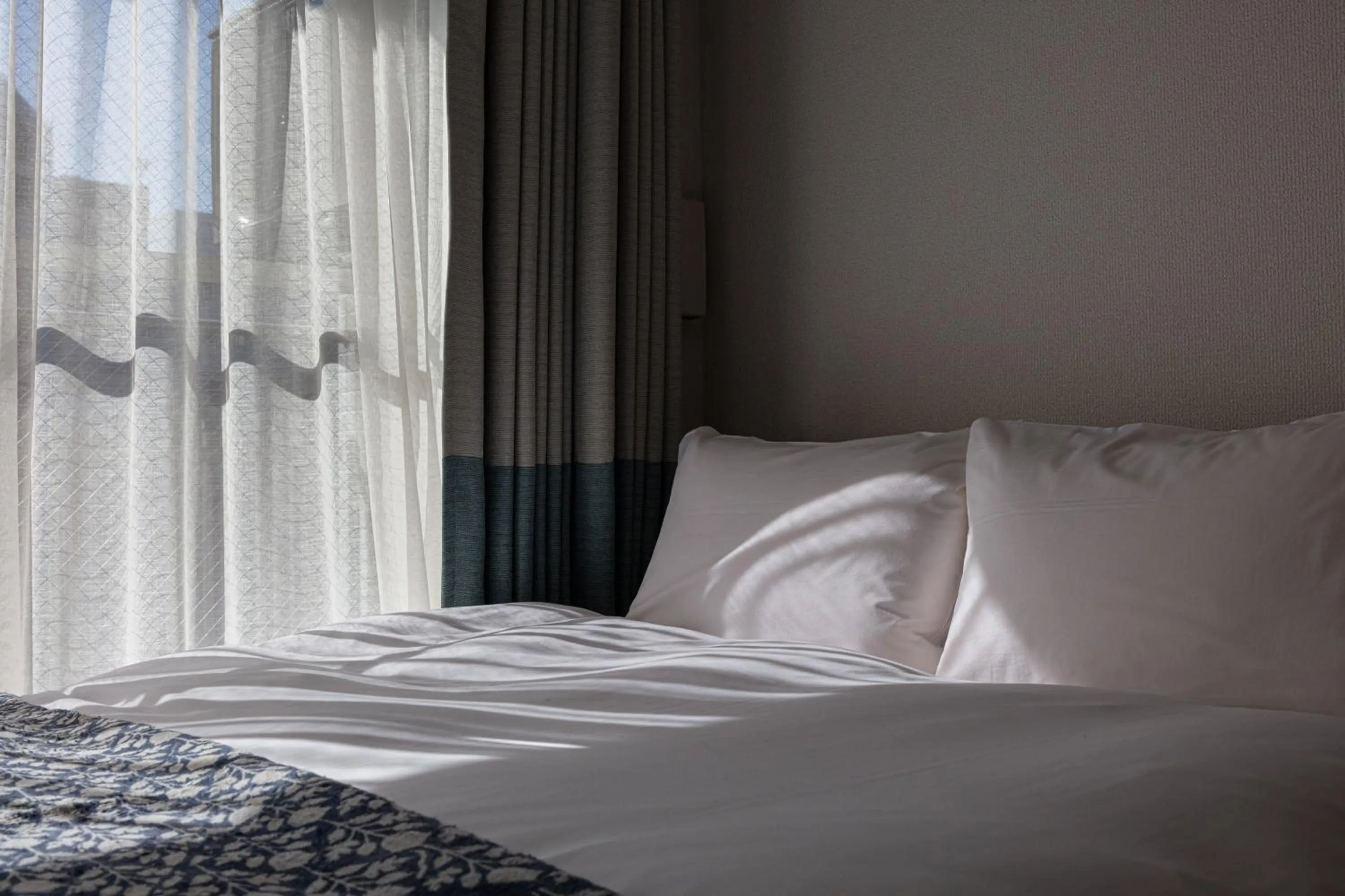 Bed in yksi STAY ＆ APARTMENT OSAKA