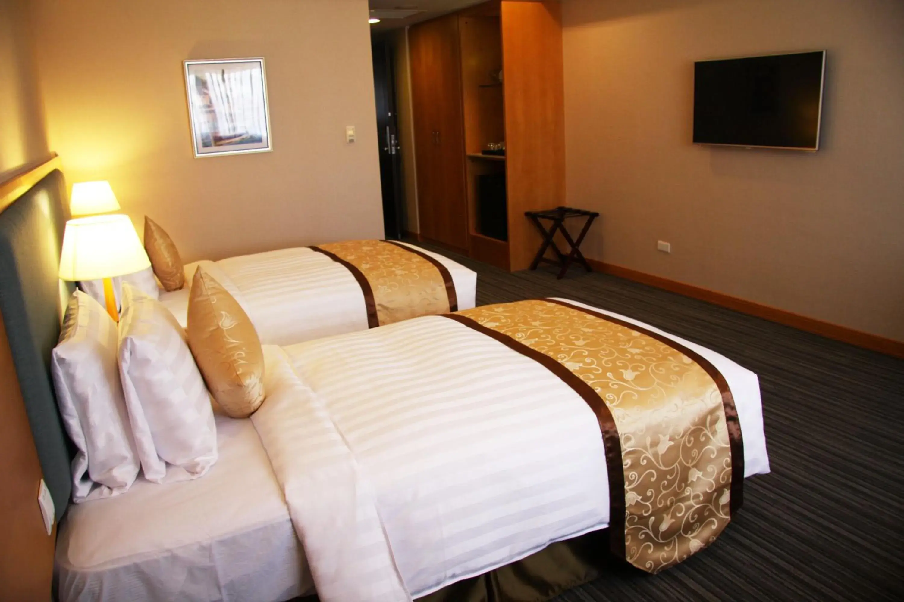 Bed in Fushin Hotel Tainan