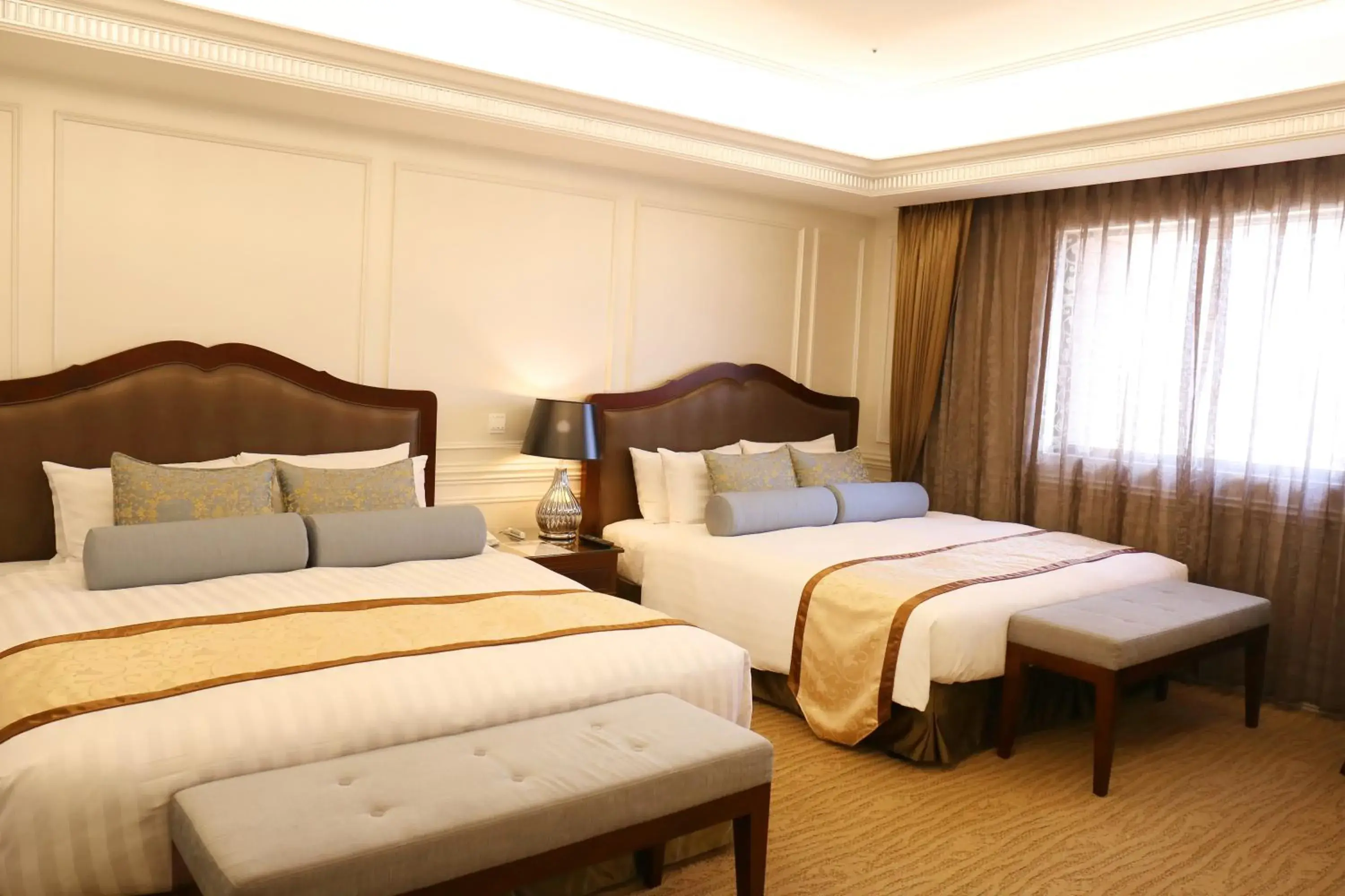Bed in Fushin Hotel Tainan