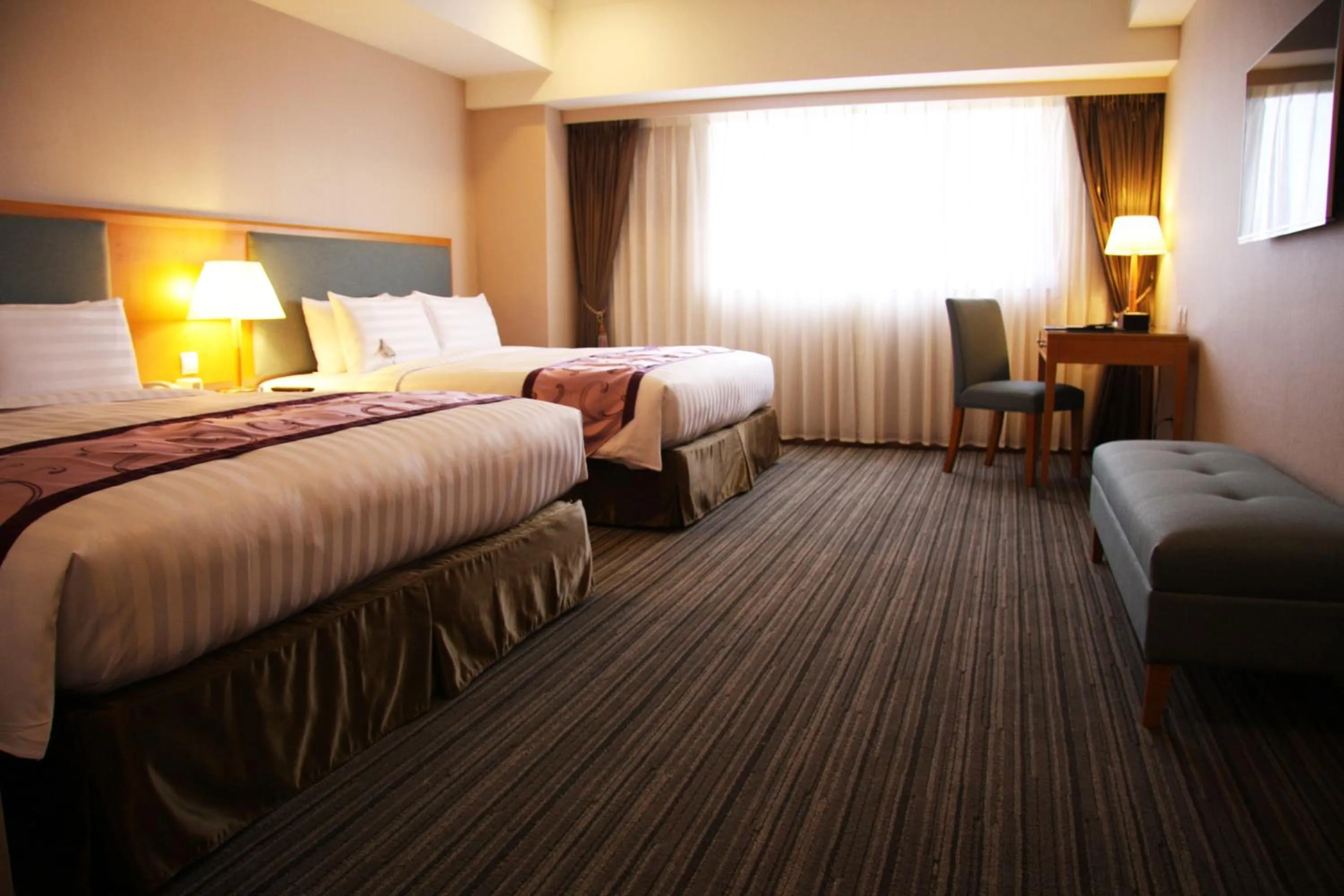 Bed in Fushin Hotel - Tainan