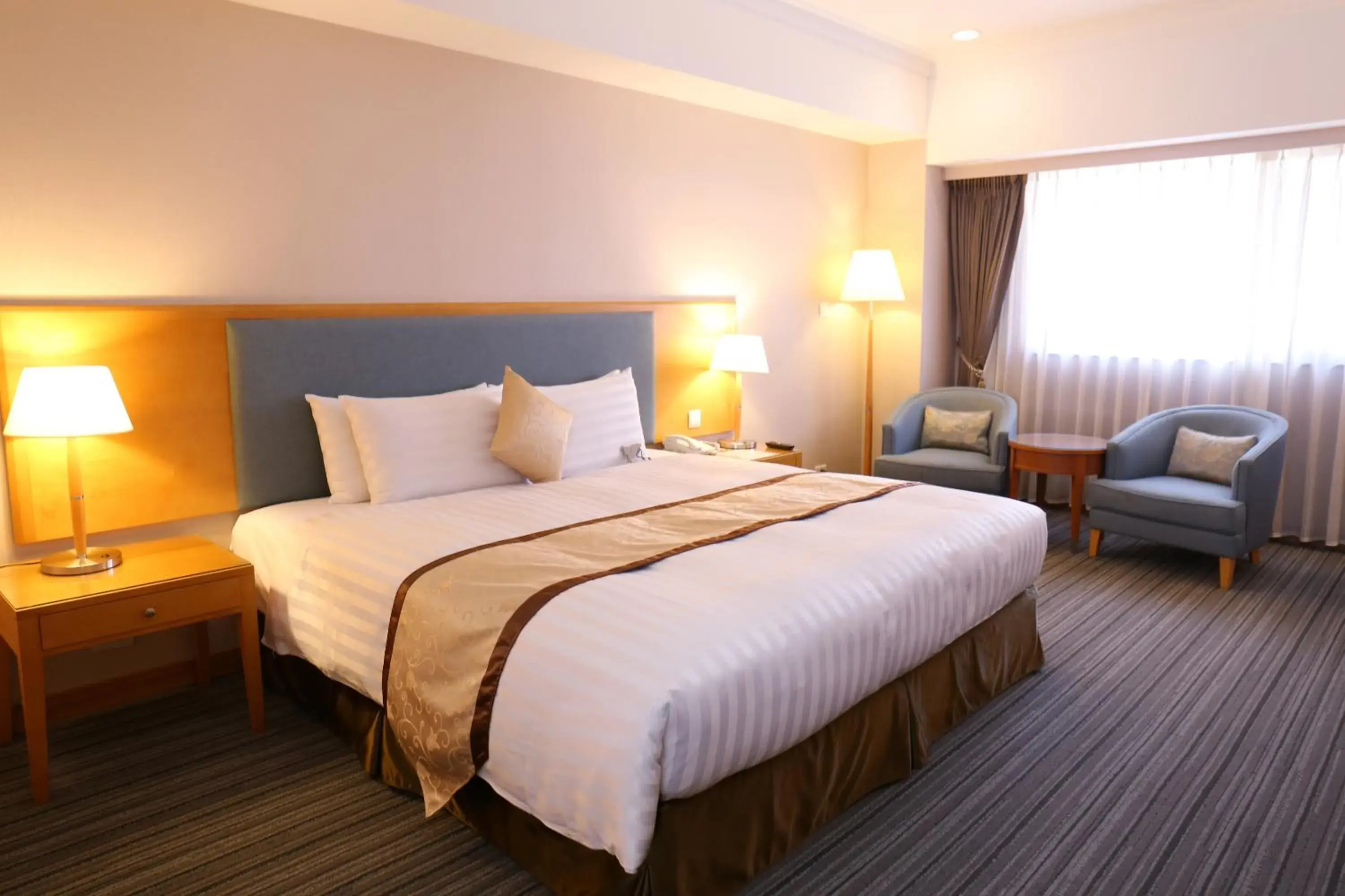 Bed in Fushin Hotel Tainan
