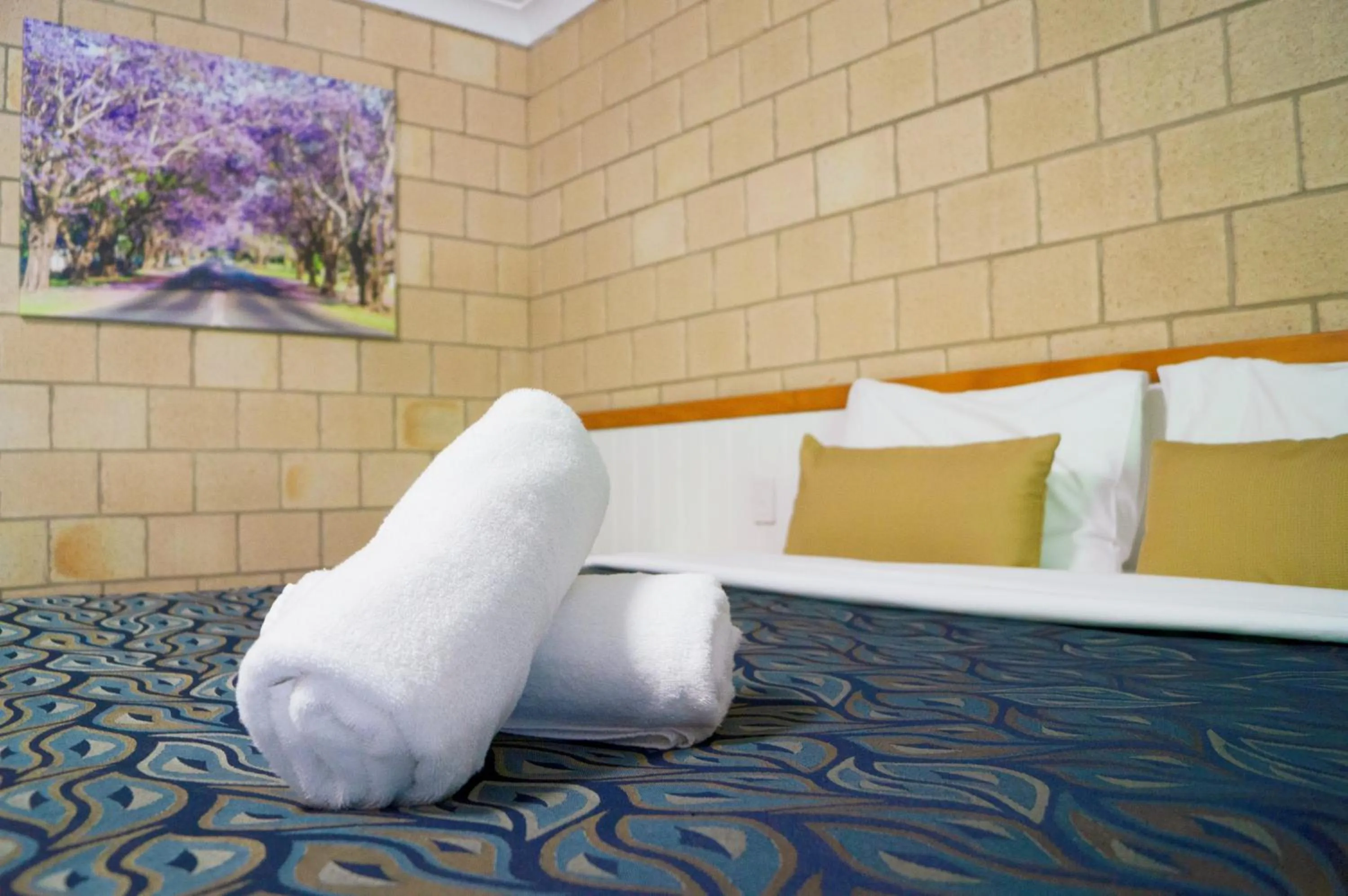 Bed in Jacaranda Country Motel