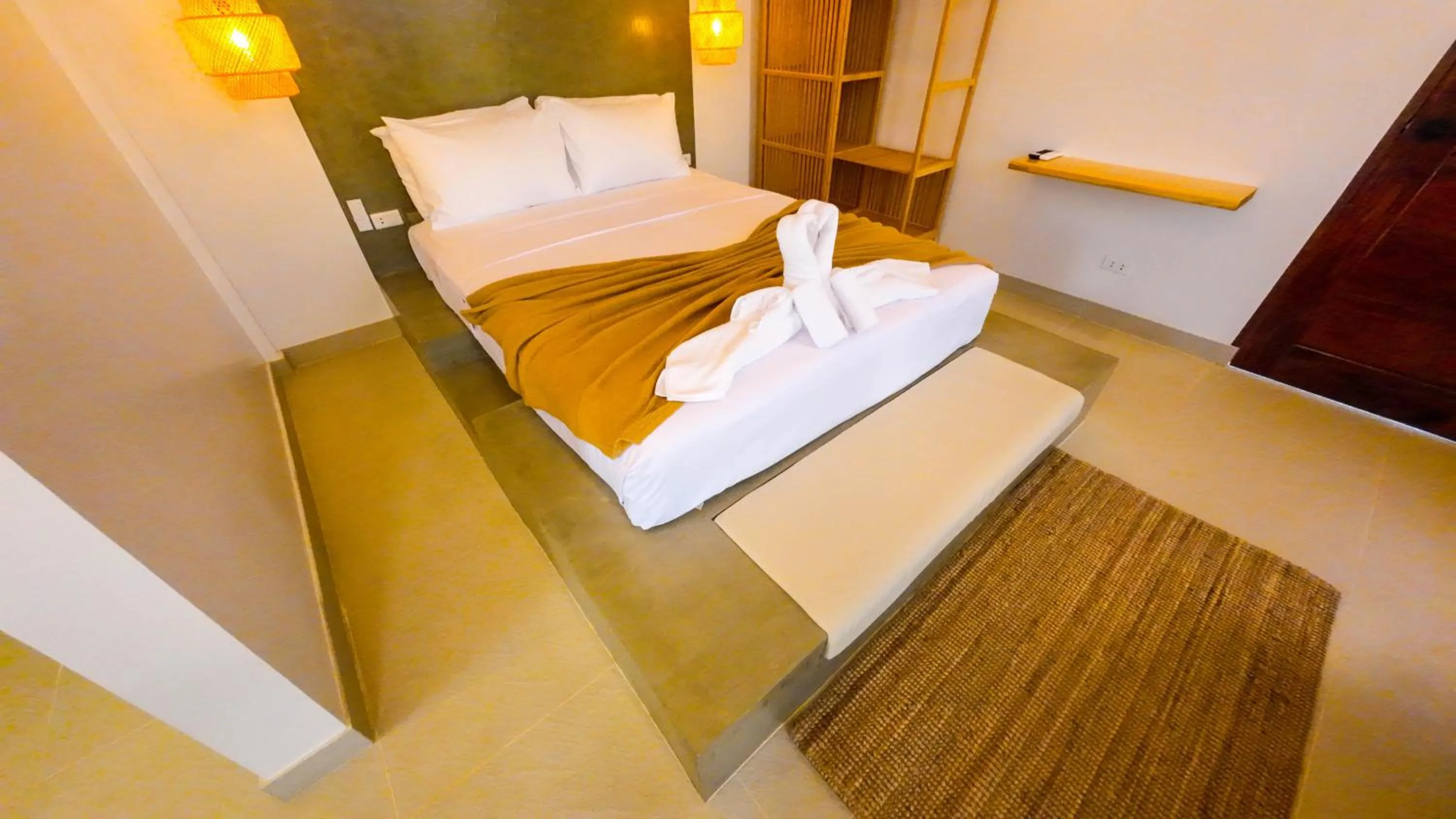 Bed in Go Boutique Inn