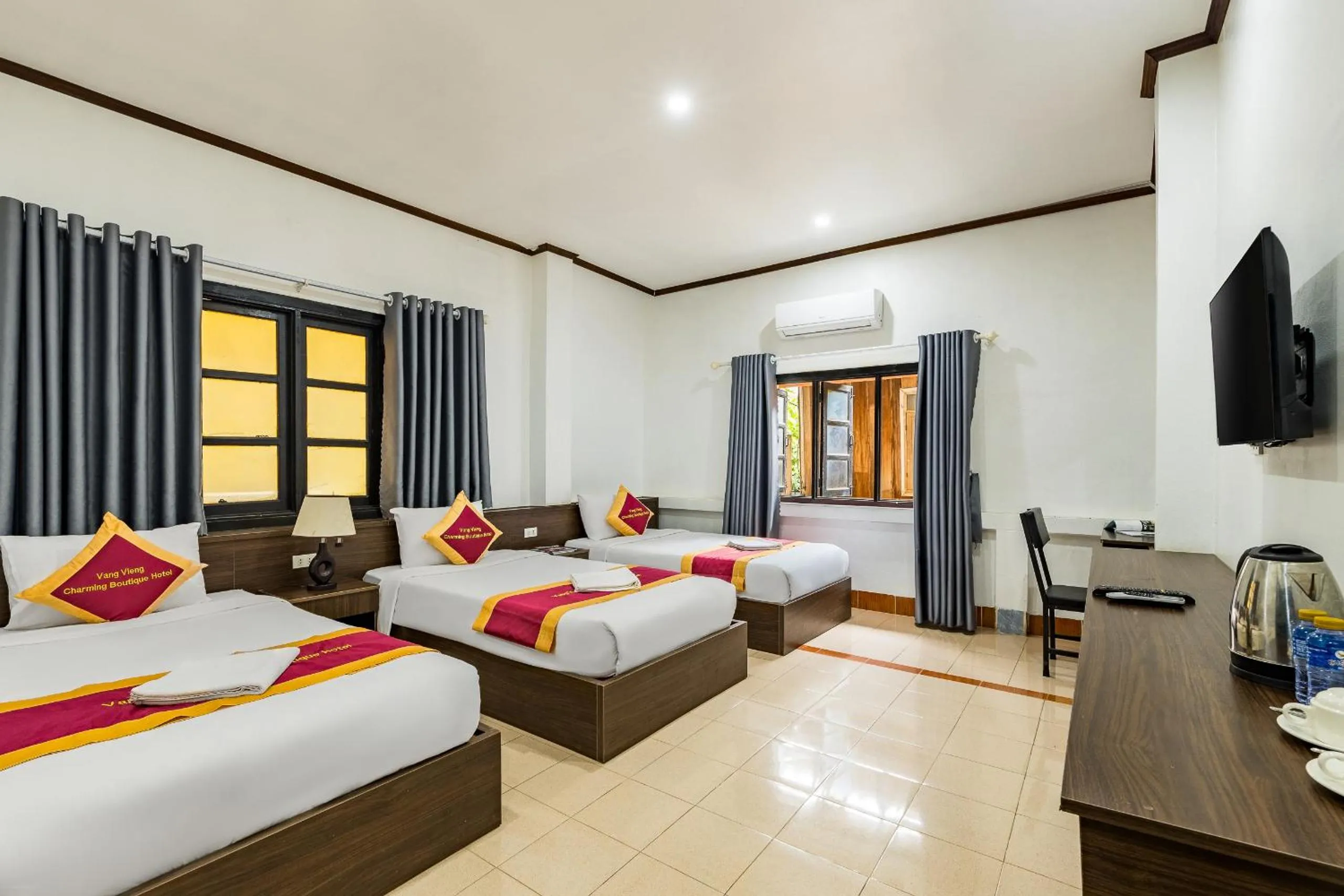 Bed in VangVieng Charming Boutique Hotel