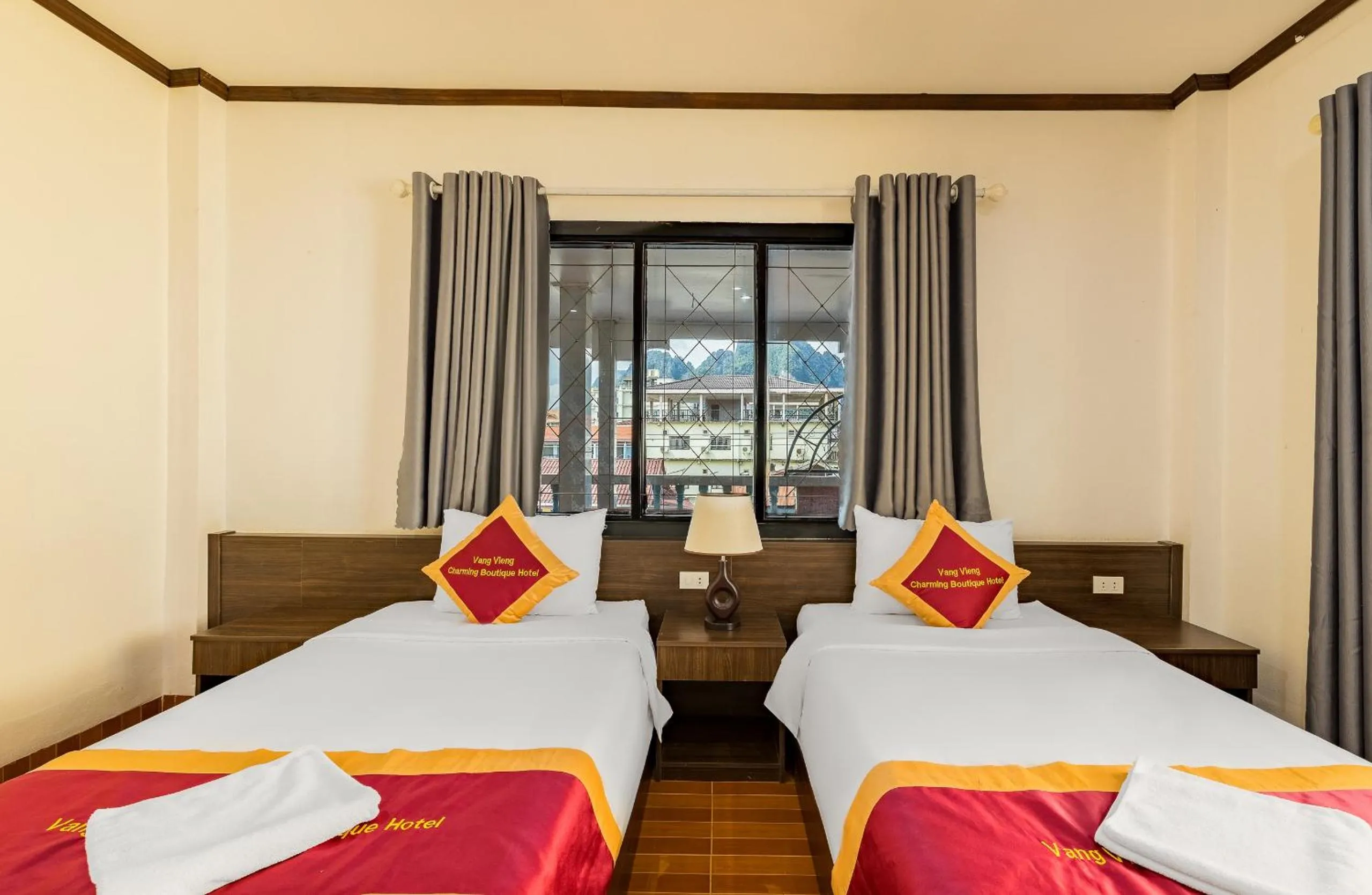 Bed in VangVieng Charming Boutique Hotel
