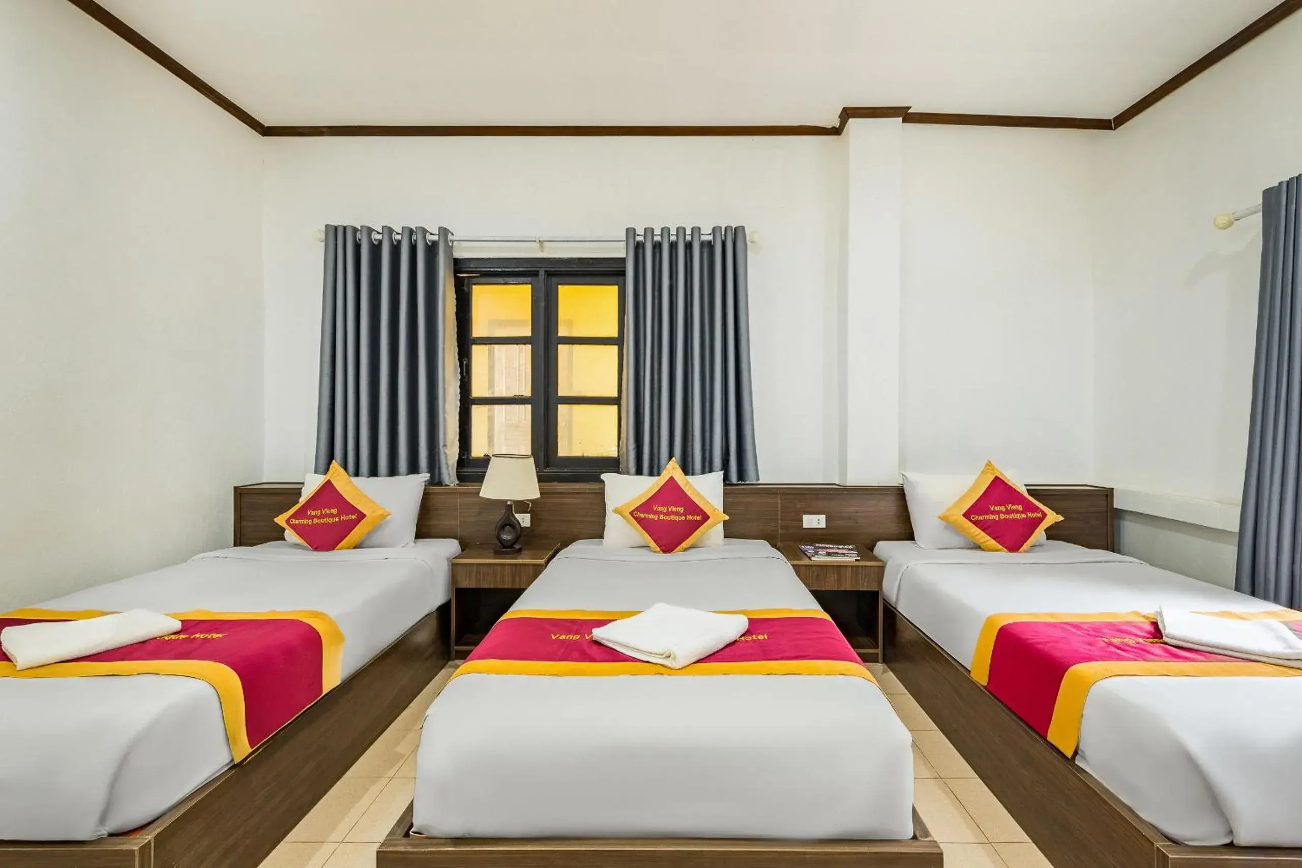 Deluxe Triple Room in VangVieng Charming Boutique Hotel Deluxe Triple Room in VangVieng Charming Boutique Hotel