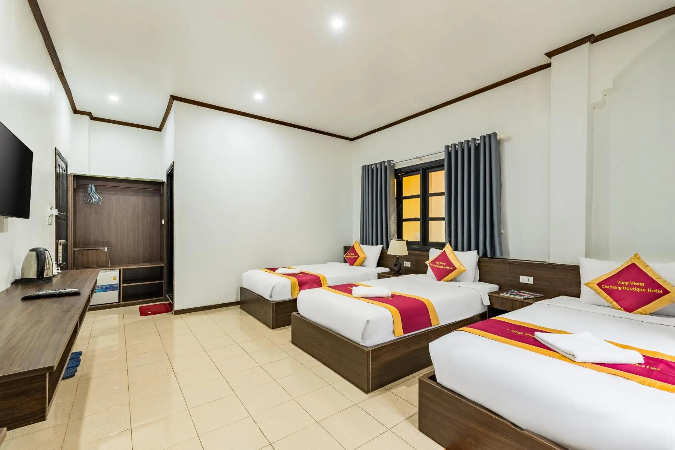 Bed in VangVieng Charming Boutique Hotel