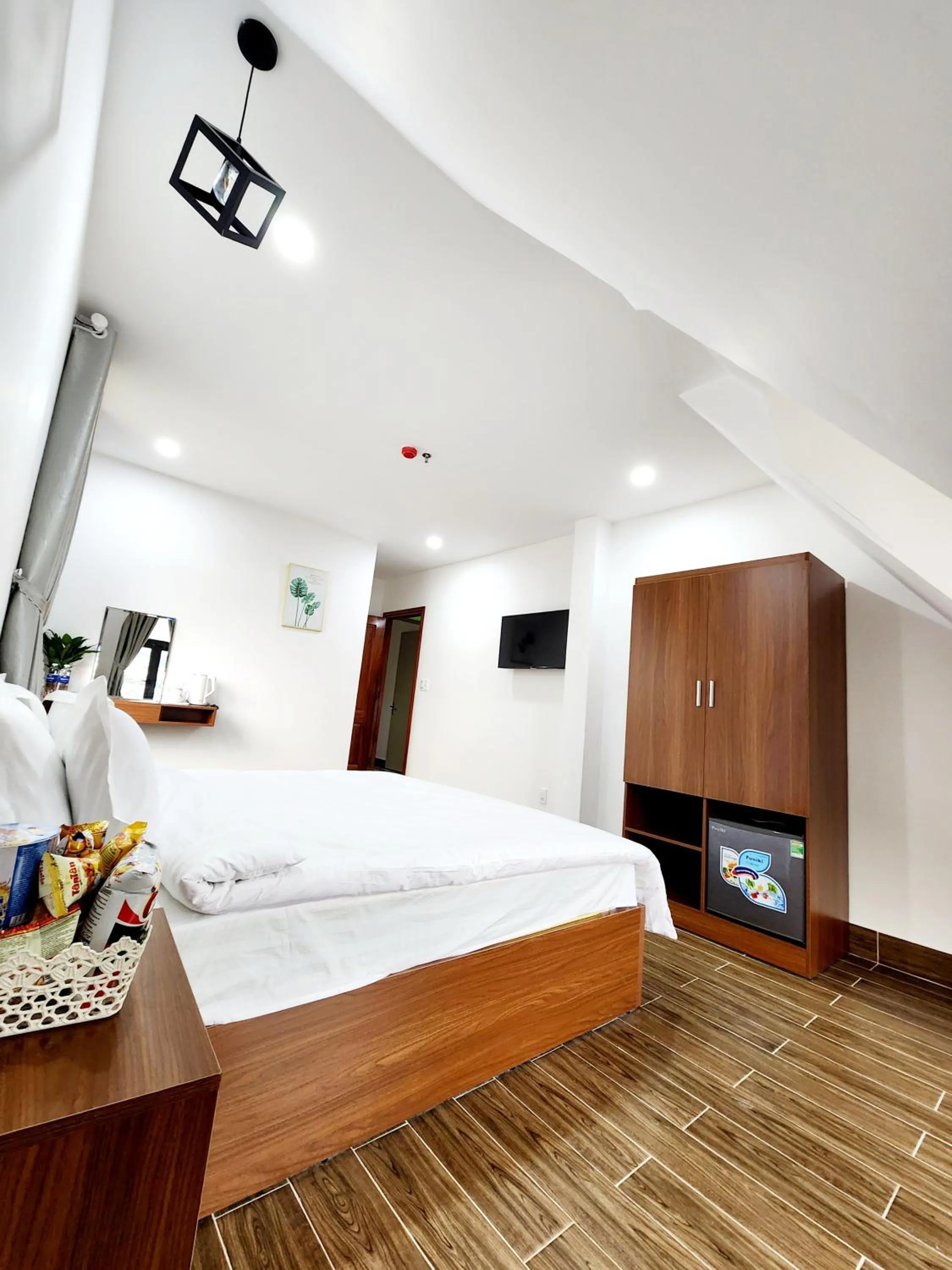 Communal lounge/ TV room, Bed in Happy Bun Hotel Da Lat