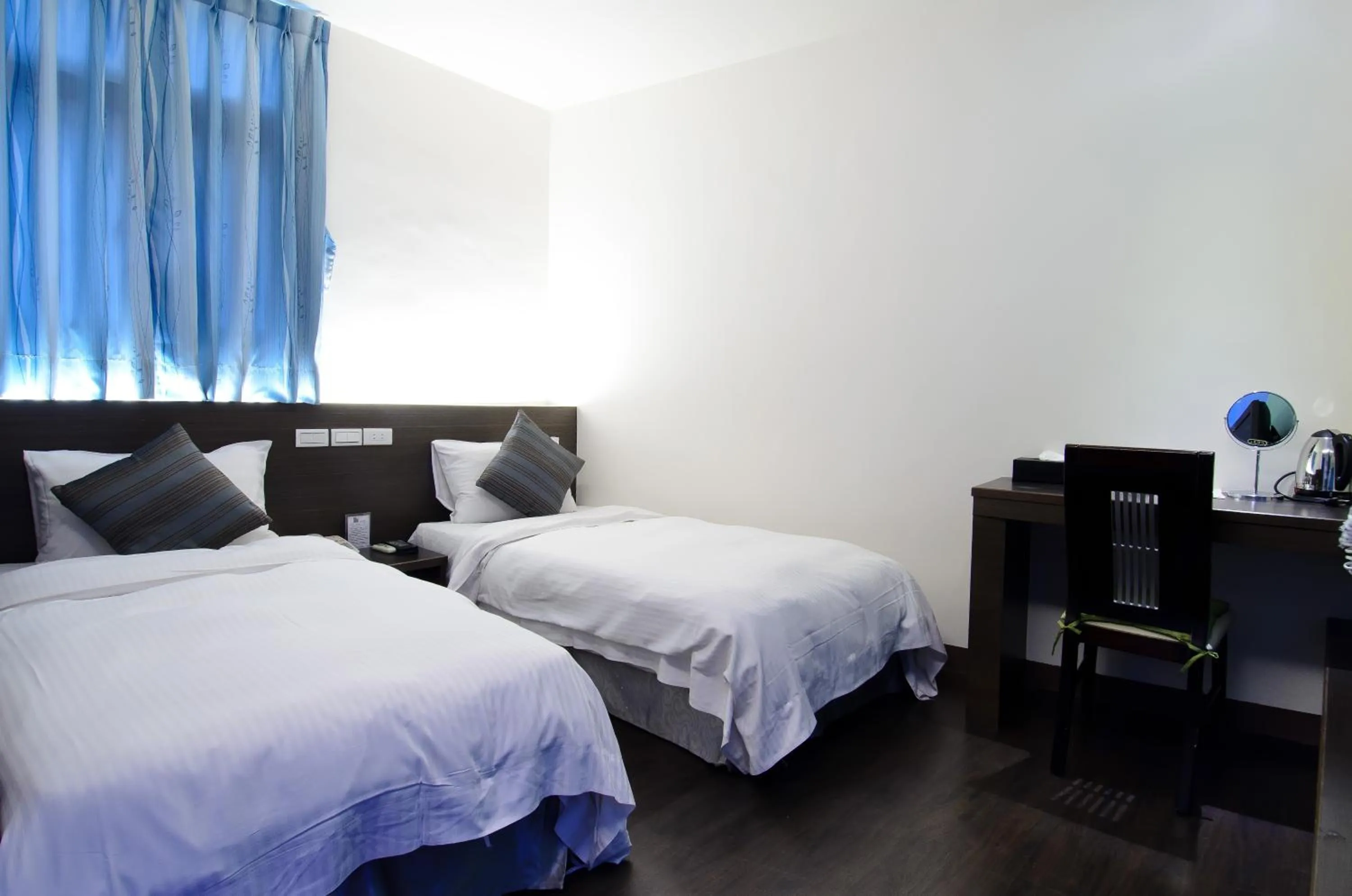 Photo of the whole room, Bed in Yuh-Tarng Hotel