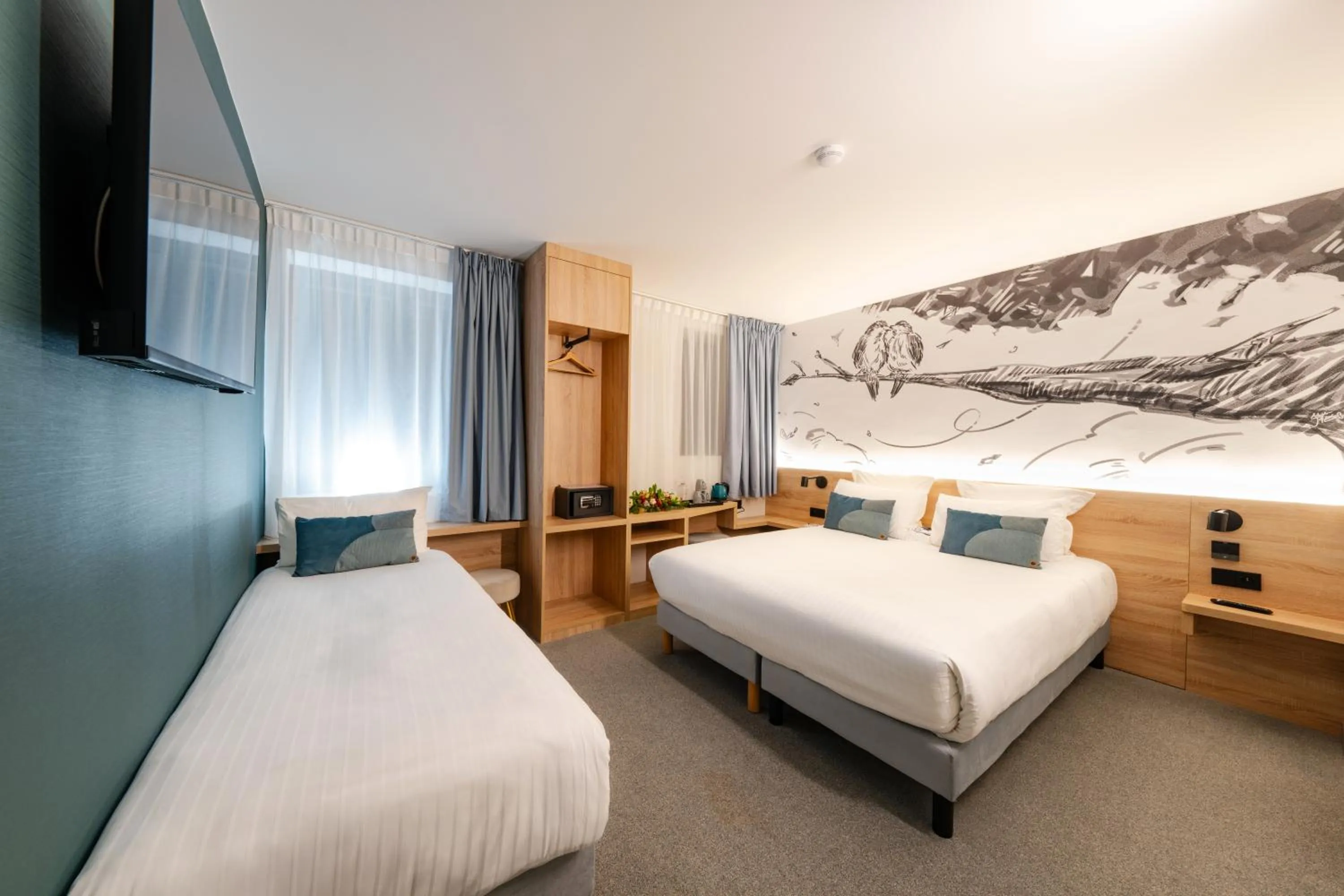 Bed in GREEN PARK HOTEL PARIS