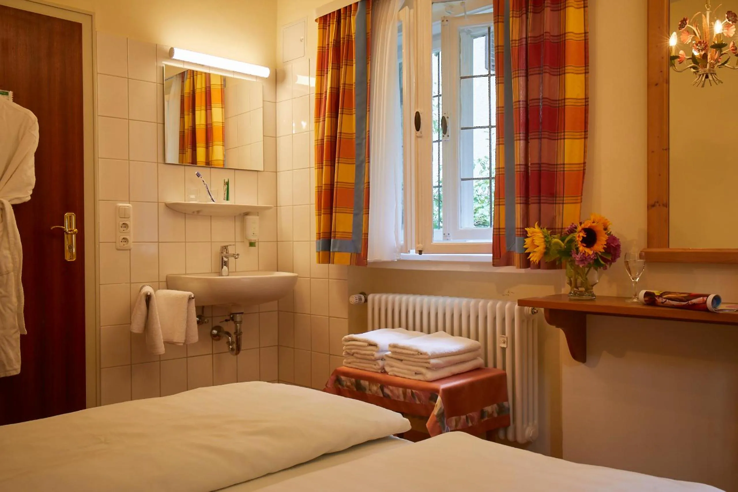 Photo of the whole room, Bed in Gästehaus Englischer Garten