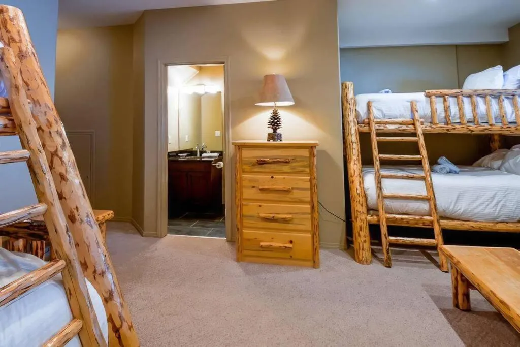 Bed in Thunder Ridge Chalet by Fernie Lodging Company