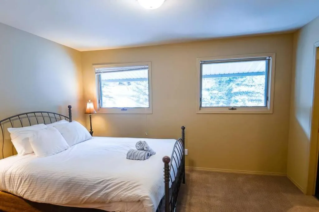 Bed in Thunder Ridge Chalet by Fernie Lodging Company