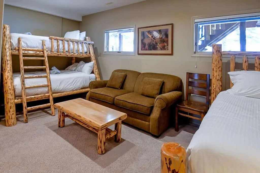 Bed in Thunder Ridge Chalet by Fernie Lodging Company