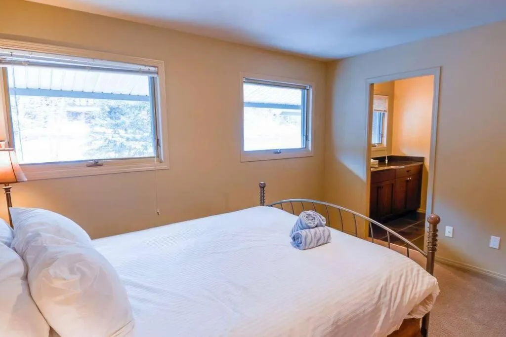 Bed in Thunder Ridge Chalet by Fernie Lodging Company