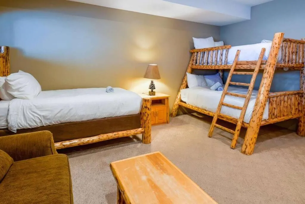 Bed in Thunder Ridge Chalet by Fernie Lodging Company