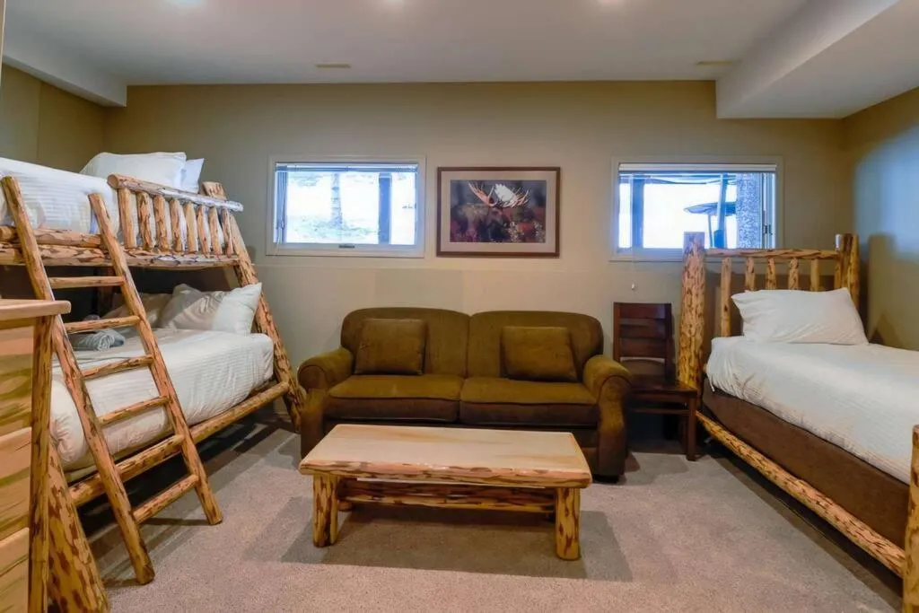 Bed in Thunder Ridge Chalet by Fernie Lodging Company