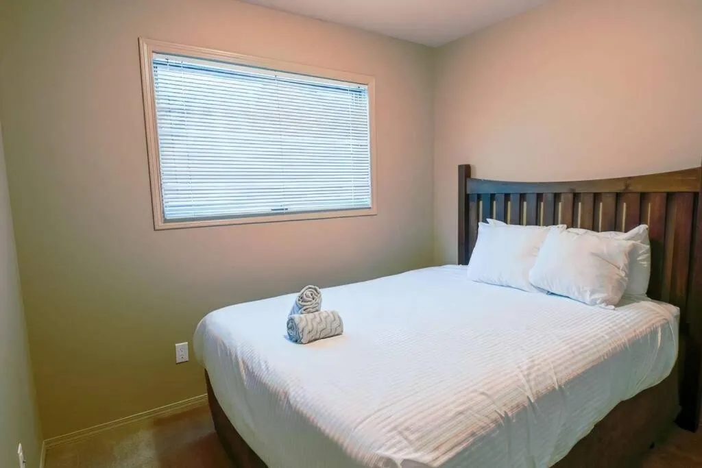 Bed in Thunder Ridge Chalet by Fernie Lodging Company