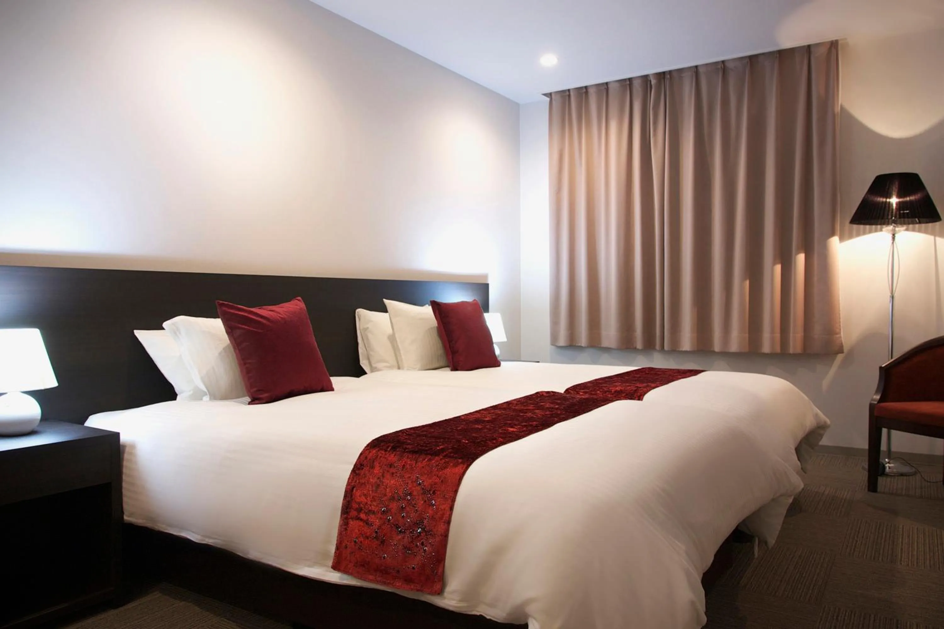 Bed in Hakuba Grand Apartments