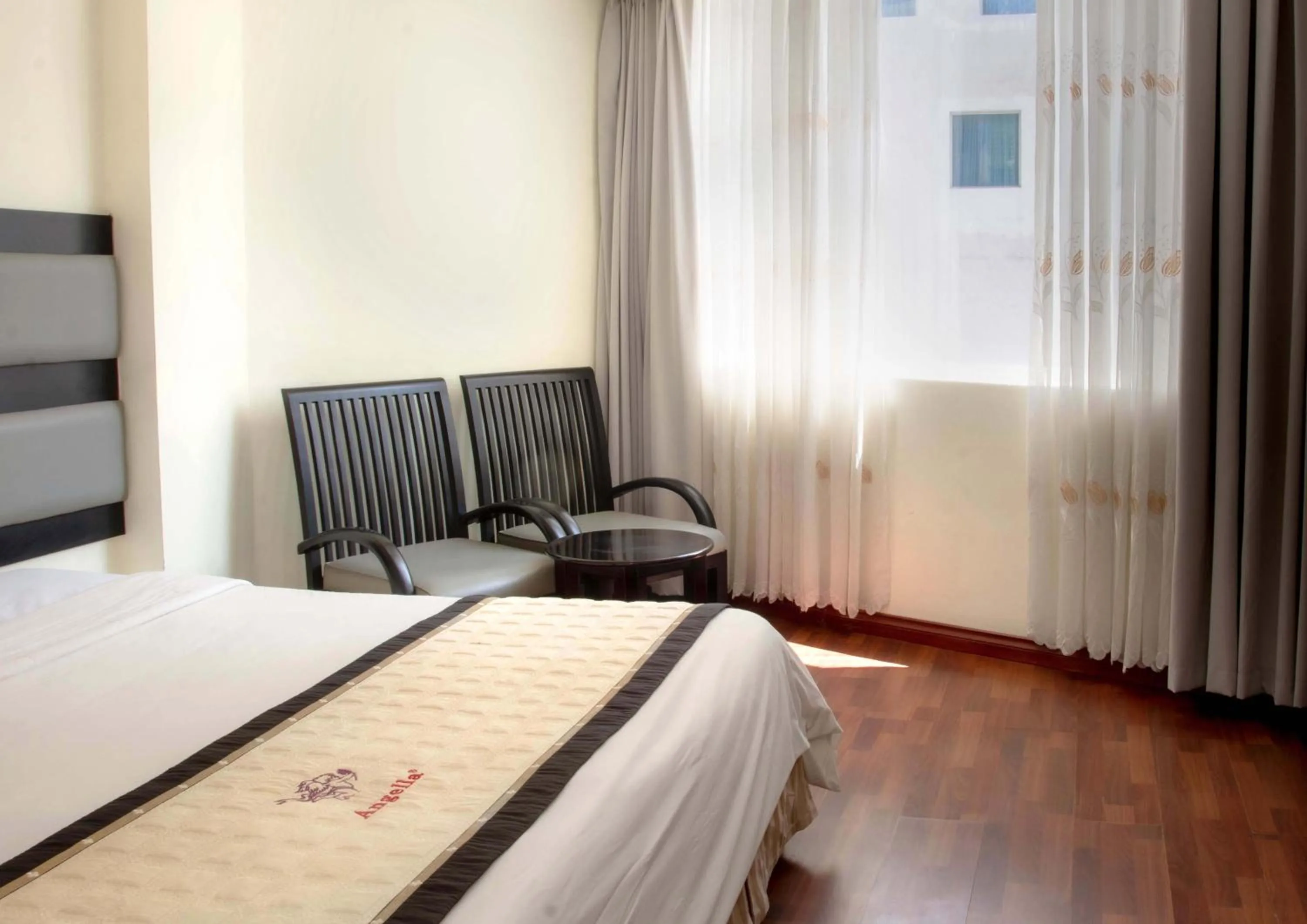 Bed in Angella Hotel