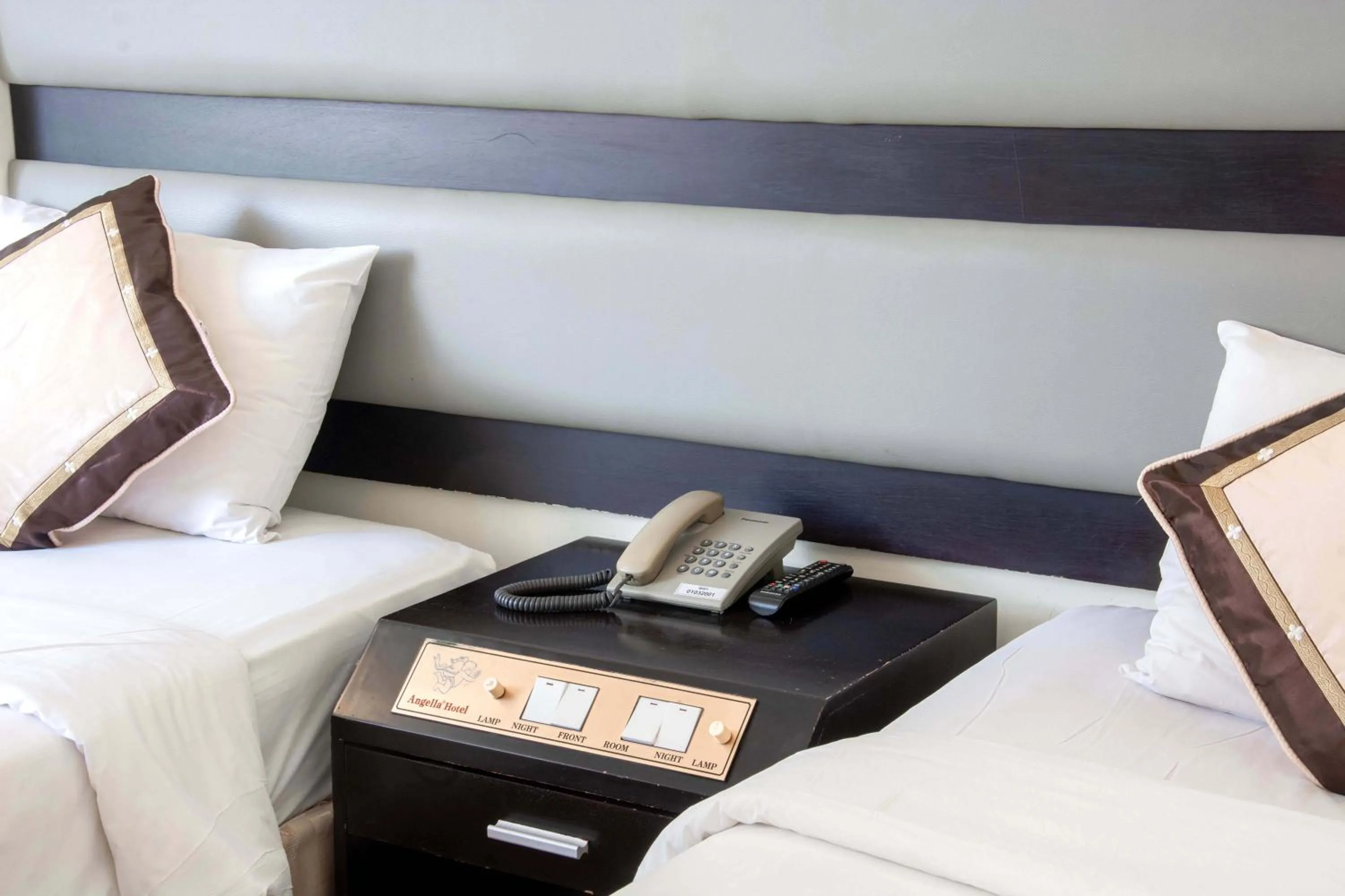 Bed in Angella Hotel