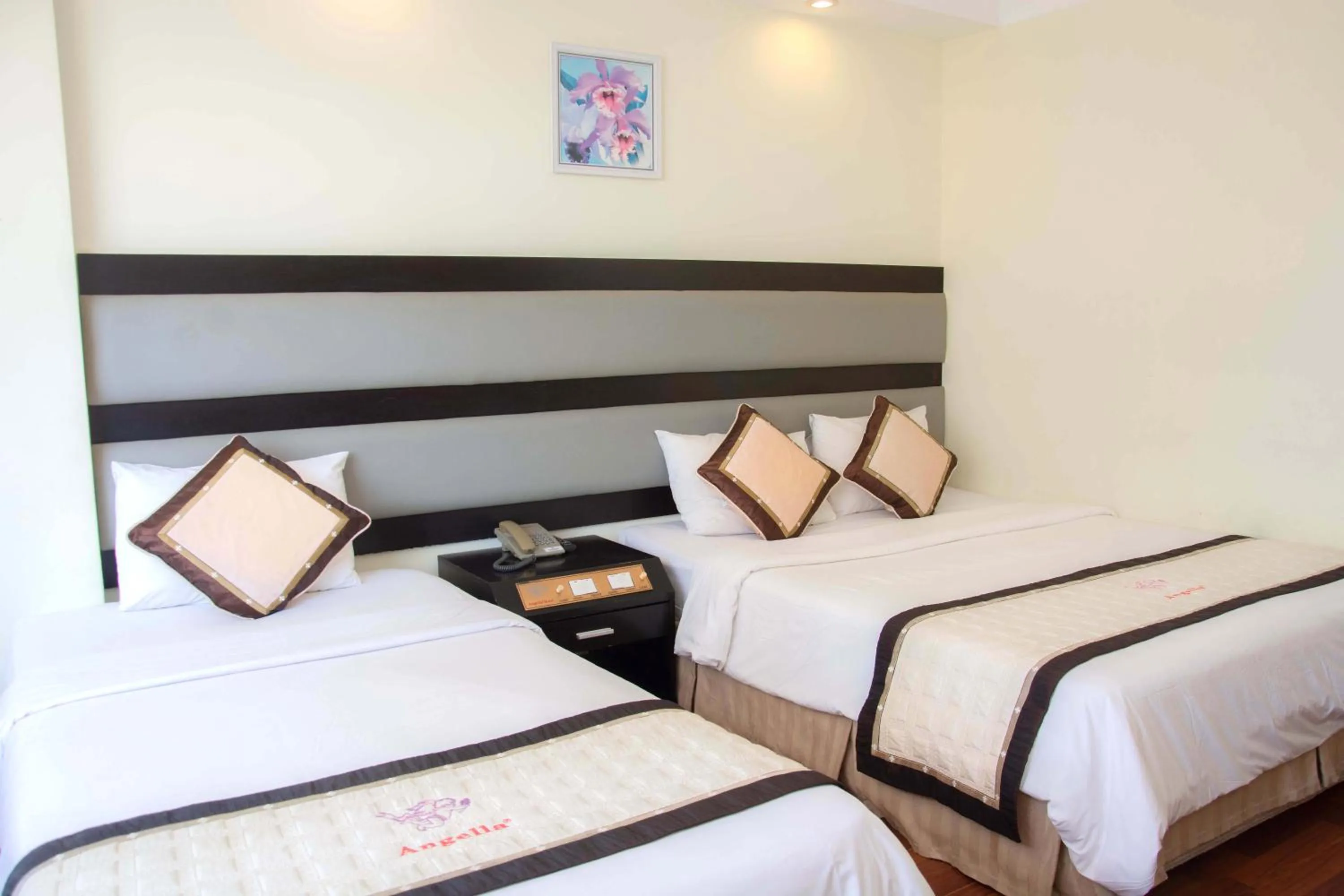 Bed in Angella Hotel