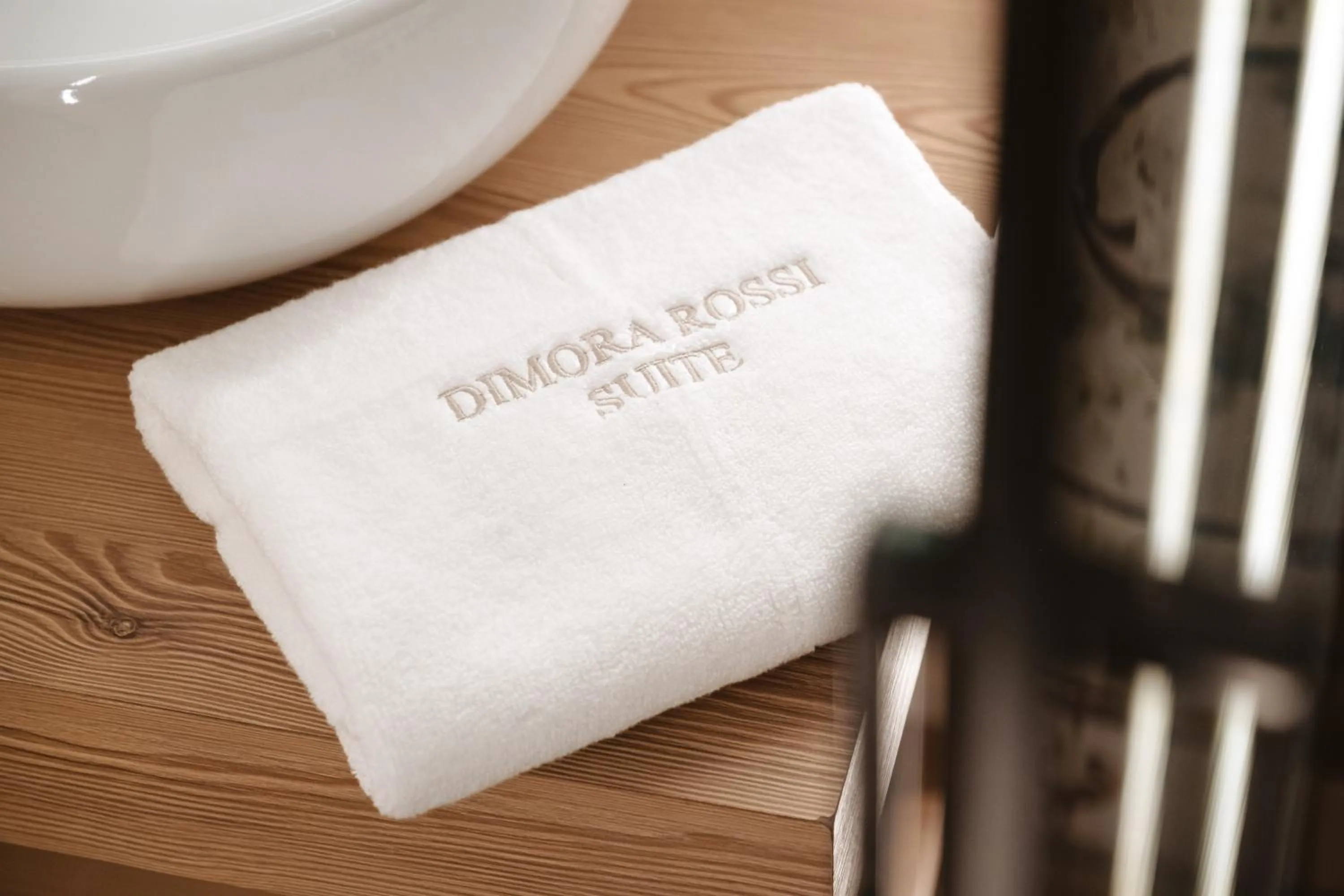 towels in ALBERGO DIFFUSO Dimora Rossi Charme B&B